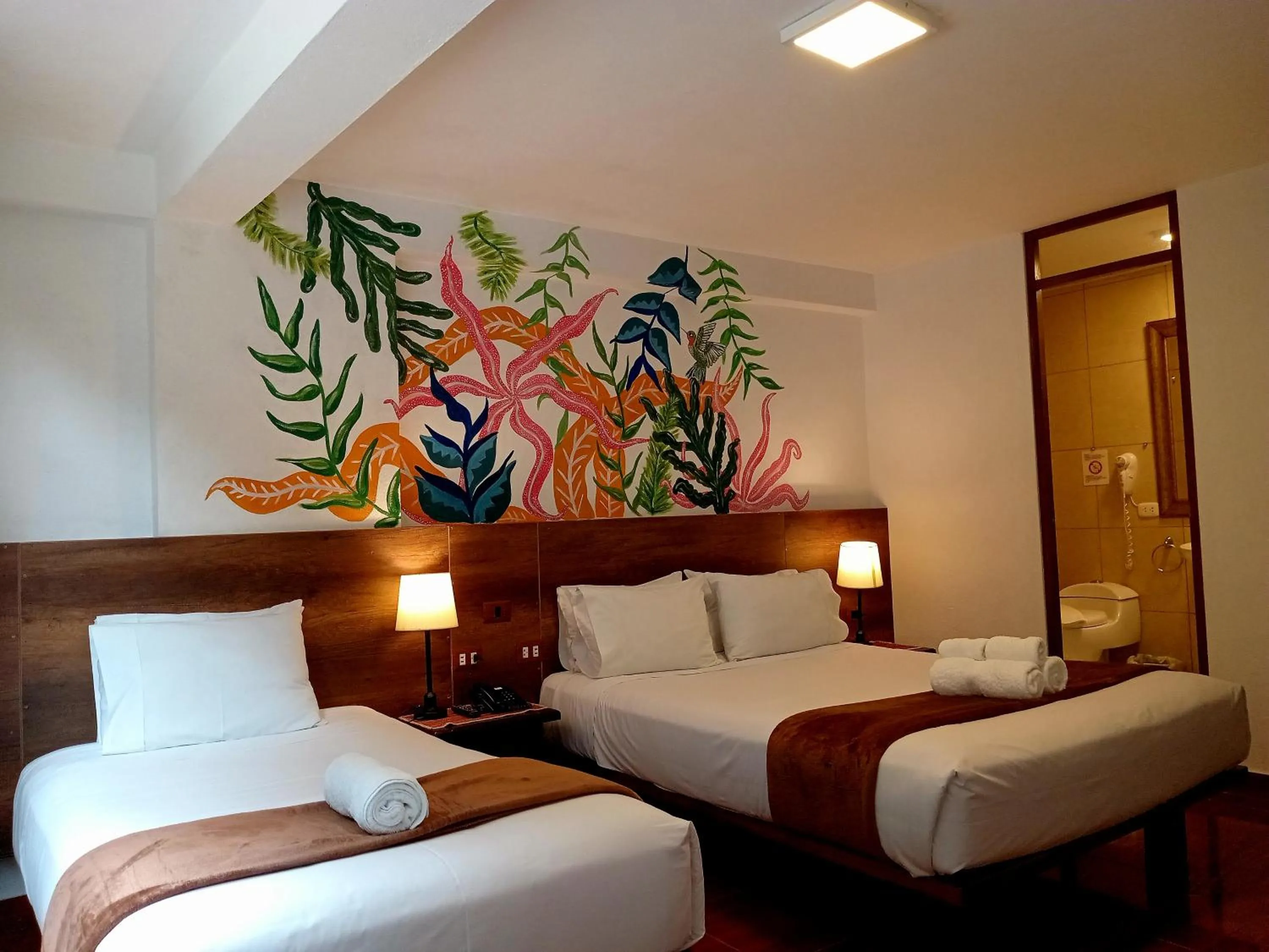 Bed in Susanna Inn MachuPicchu Hotel