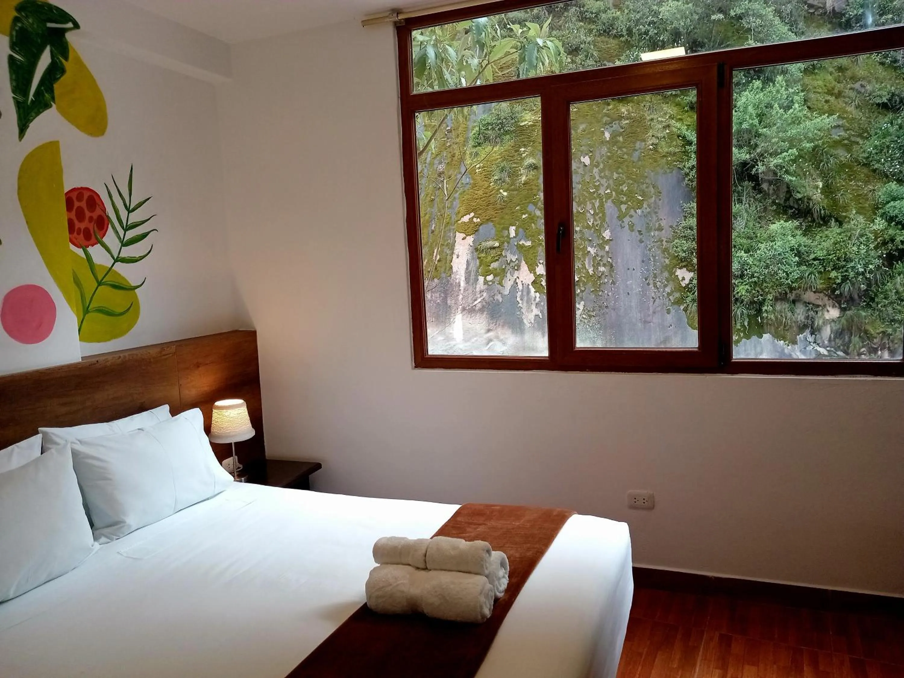 Bed in Susanna Inn MachuPicchu Hotel