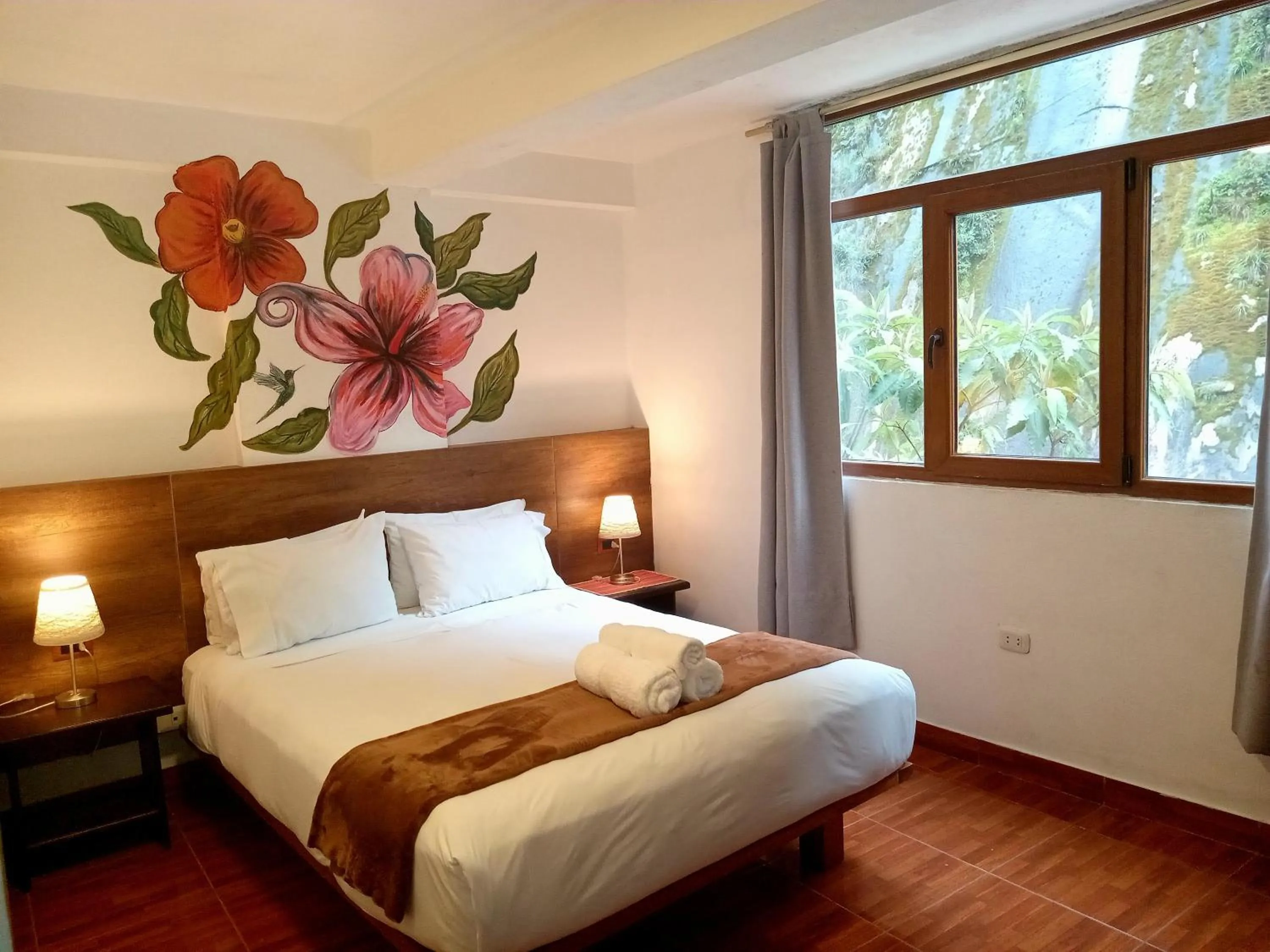 Bed in Susanna Inn MachuPicchu Hotel