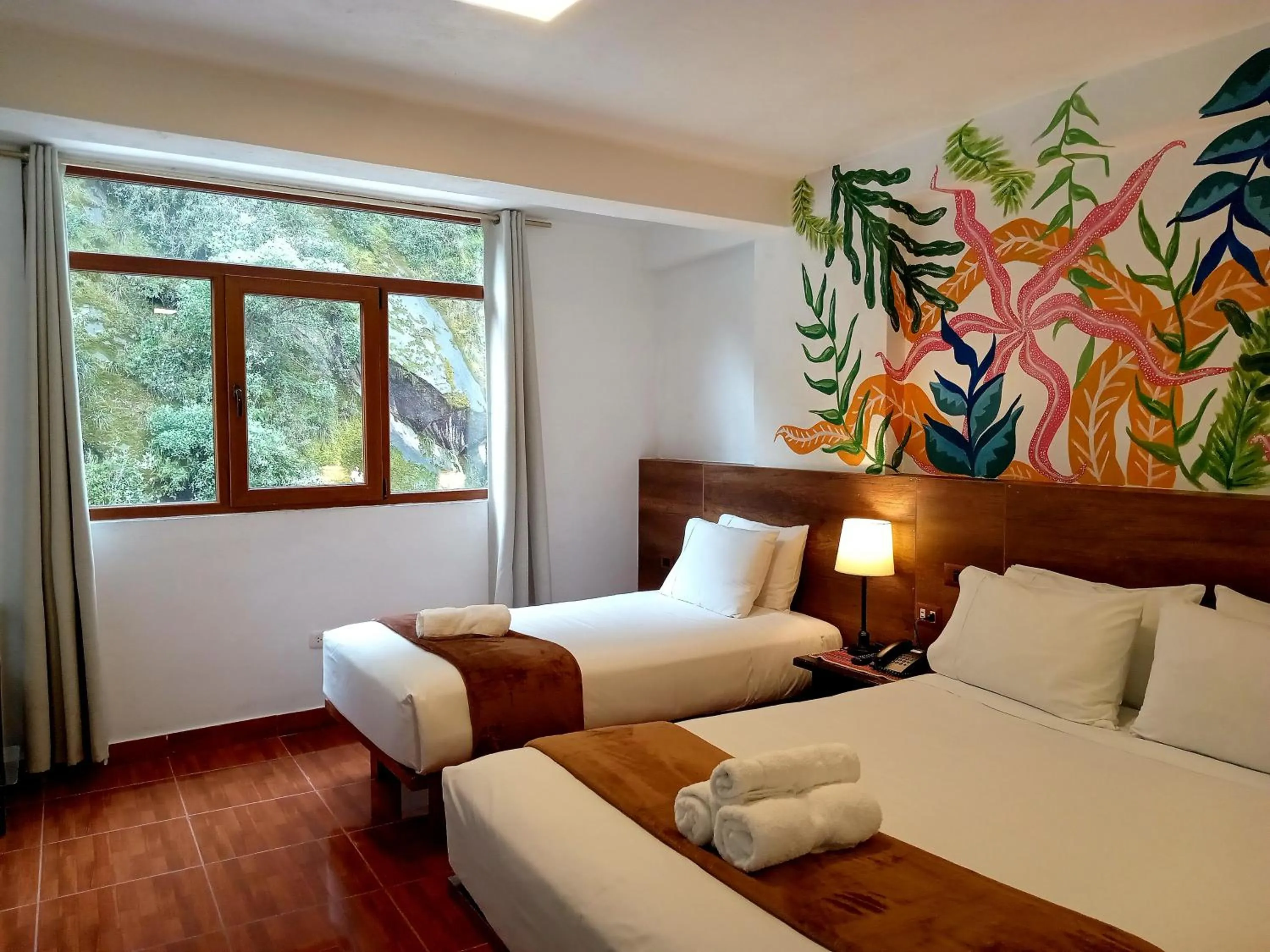 Bed in Susanna Inn MachuPicchu Hotel