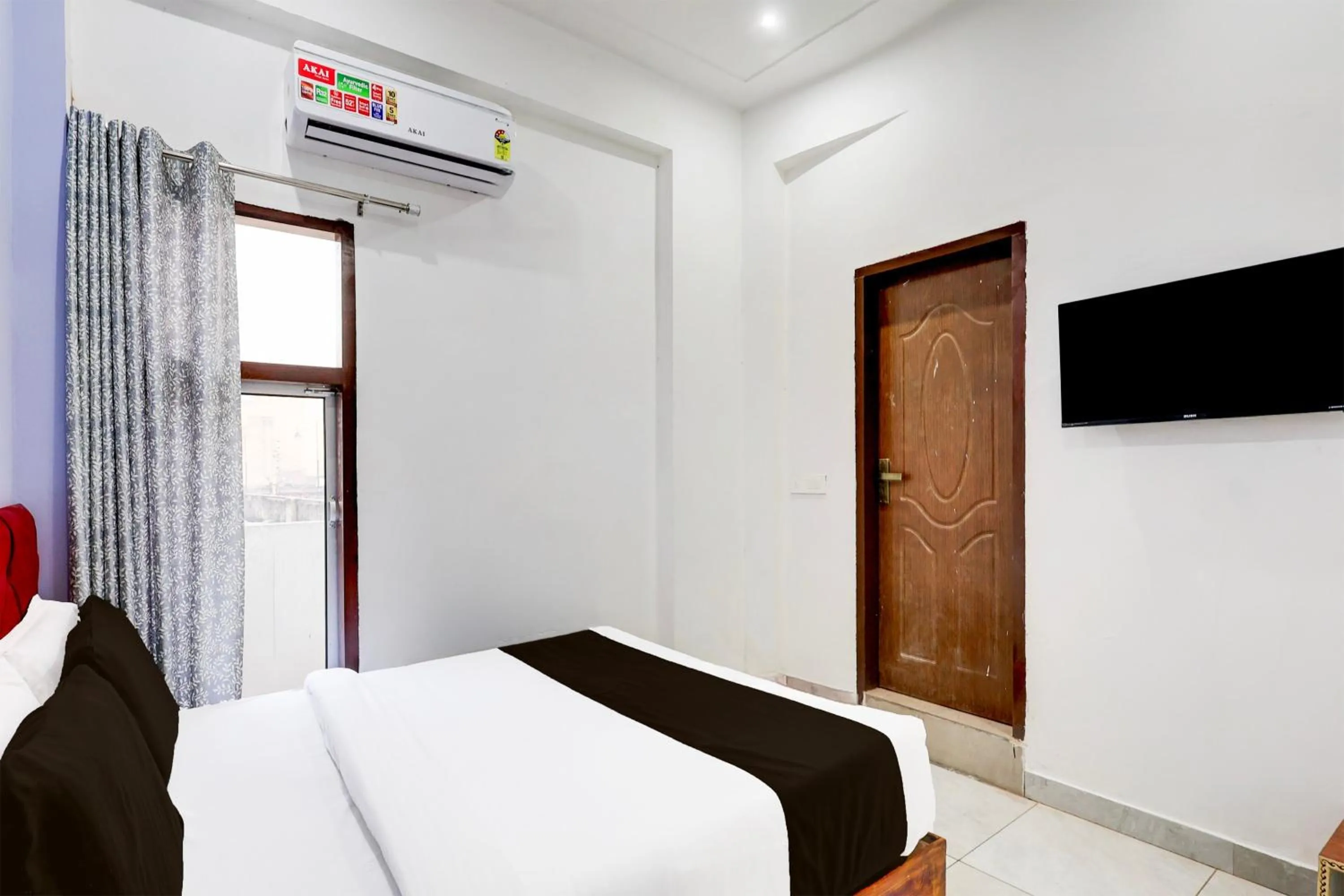 Bedroom, Bed in Super Hotel O Ambedkar Chowk Rewari formerly Hotel Shree