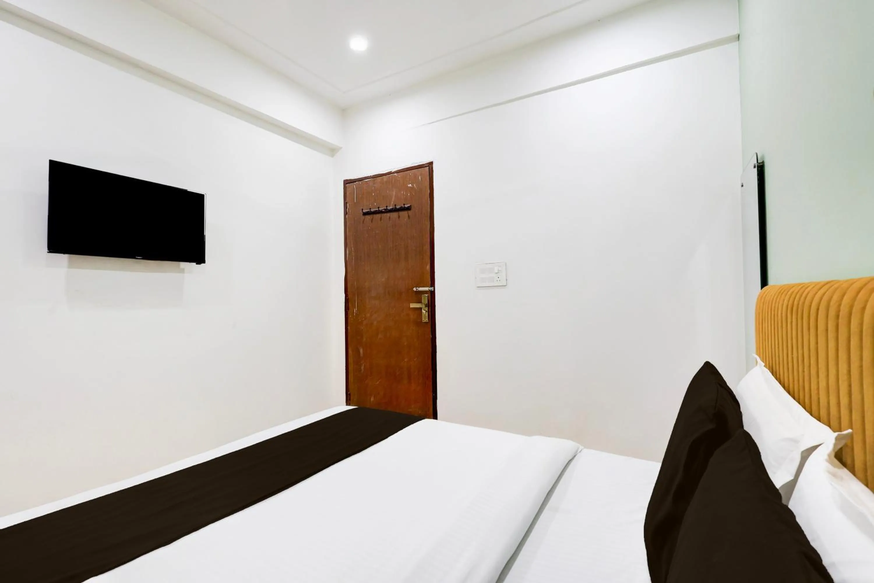 Bedroom, Bed in Super Hotel O Ambedkar Chowk Rewari formerly Hotel Shree