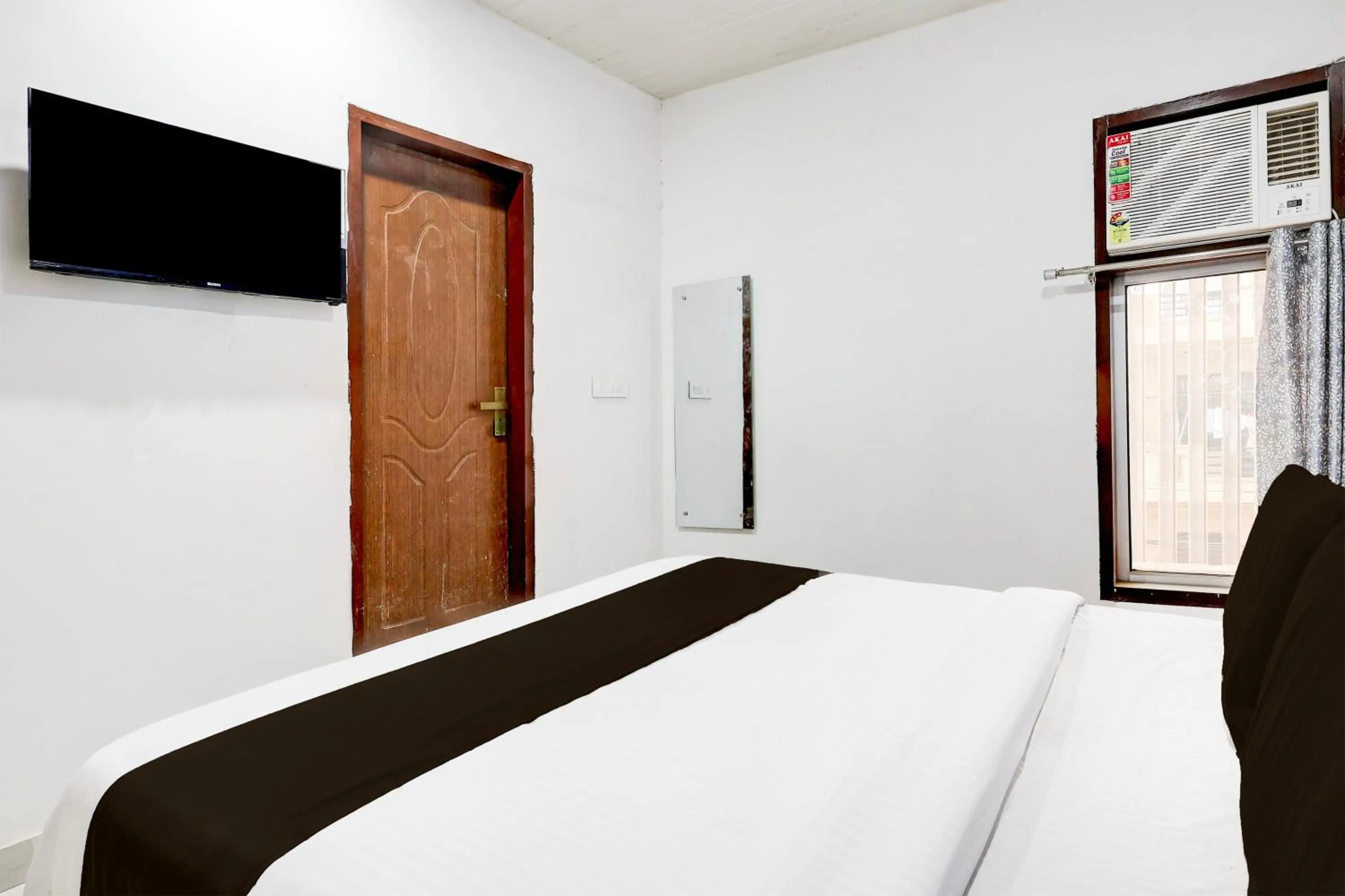 Bedroom, Bed in Super Hotel O Ambedkar Chowk Rewari formerly Hotel Shree