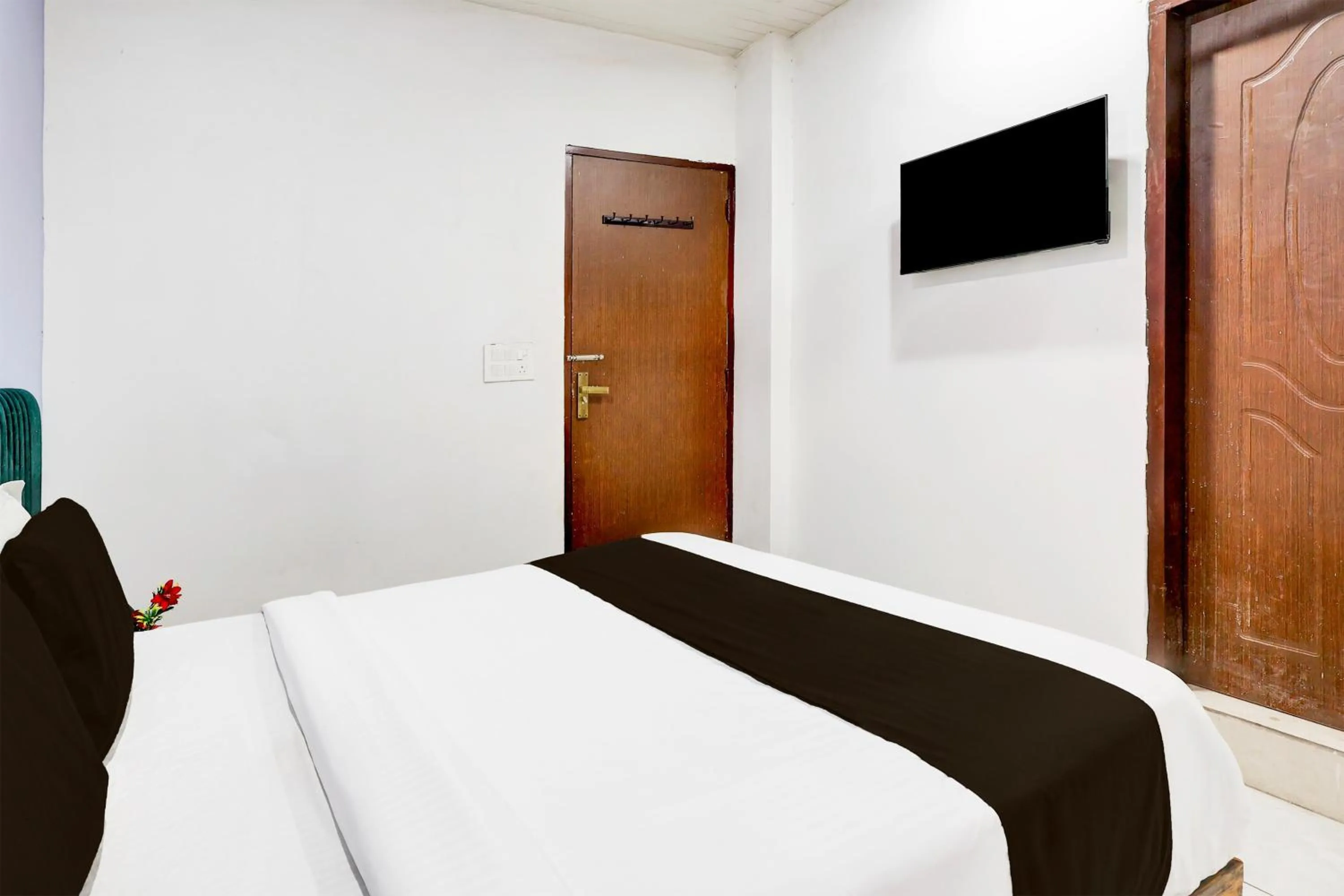 Bedroom, Bed in Super Hotel O Ambedkar Chowk Rewari formerly Hotel Shree
