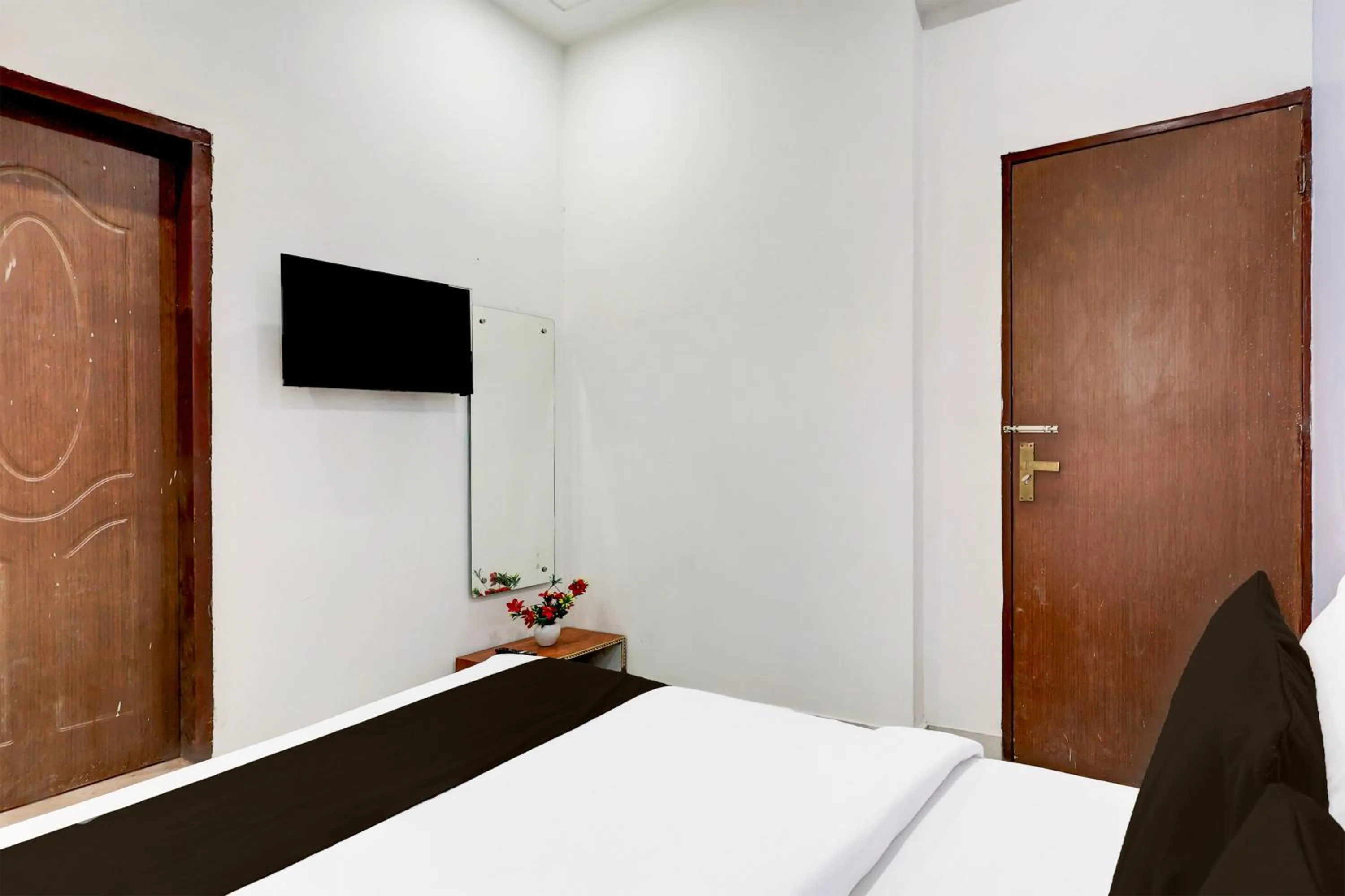 Bedroom, Bed in Super Hotel O Ambedkar Chowk Rewari formerly Hotel Shree