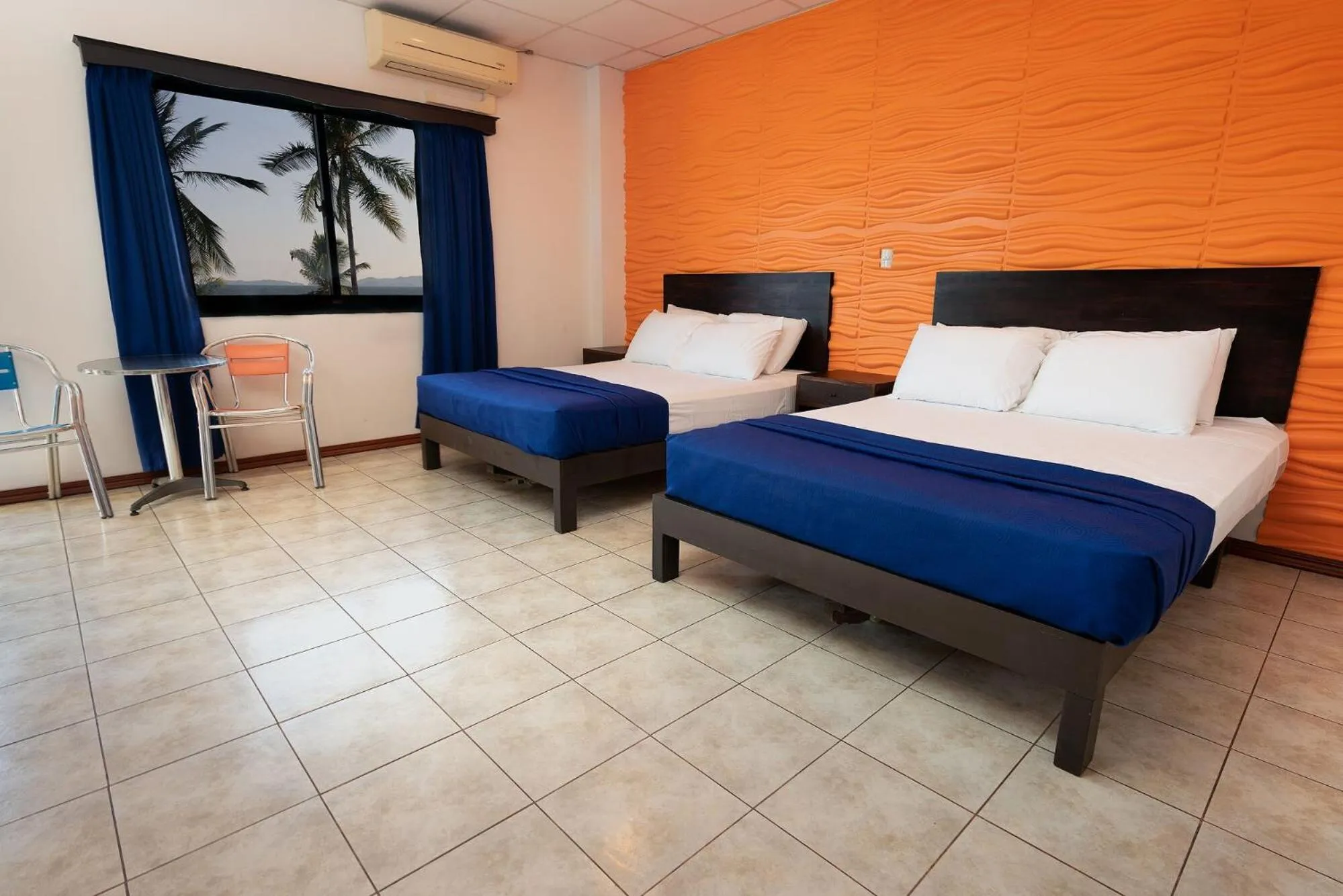 Bed in Hotel Puntarenas Beach