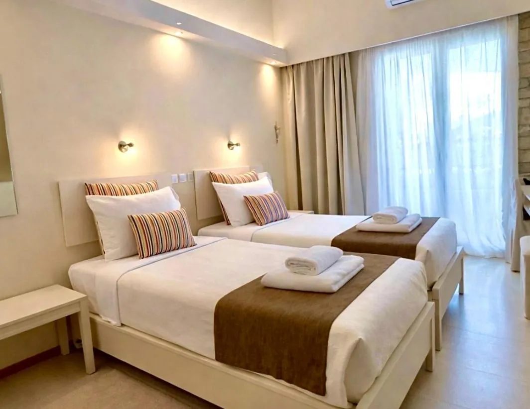 Bed in Nidimos Hotel