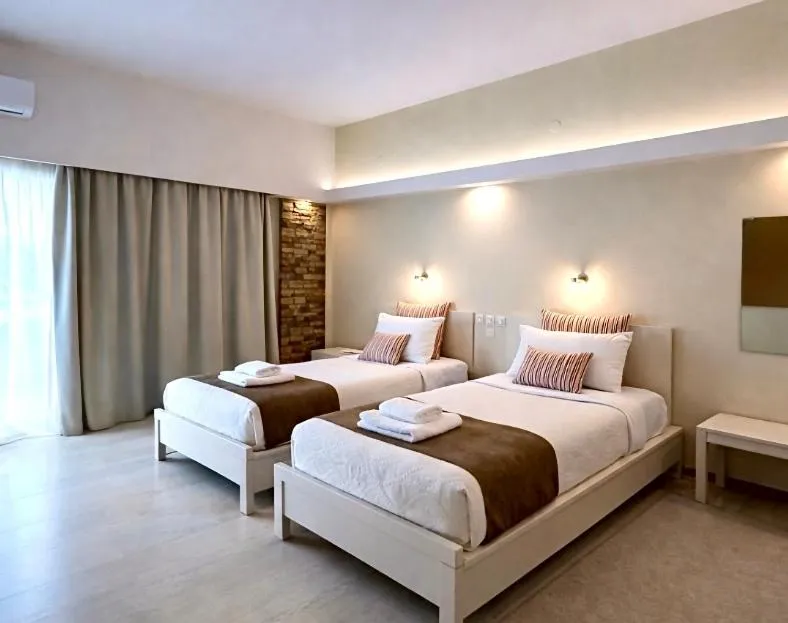 Bed in Nidimos Hotel