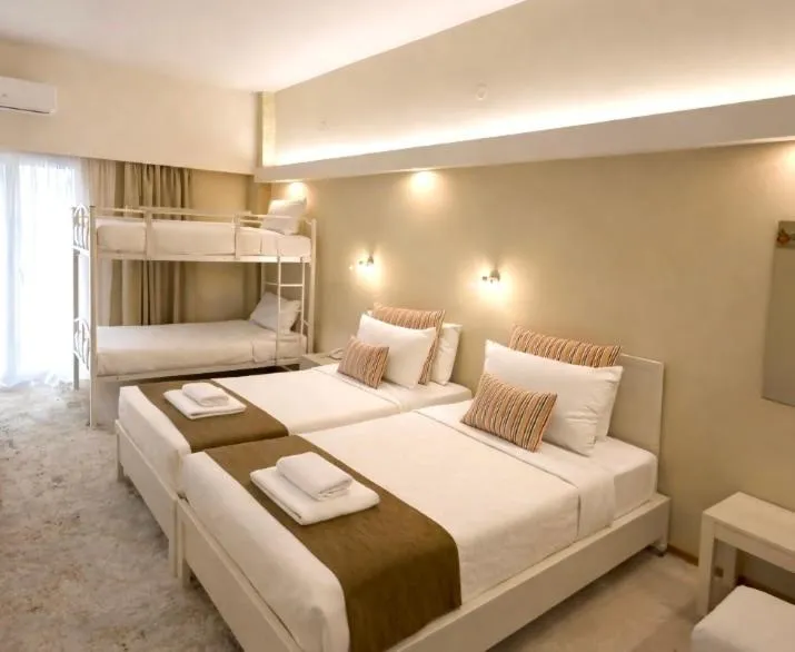 Bed in Nidimos Hotel