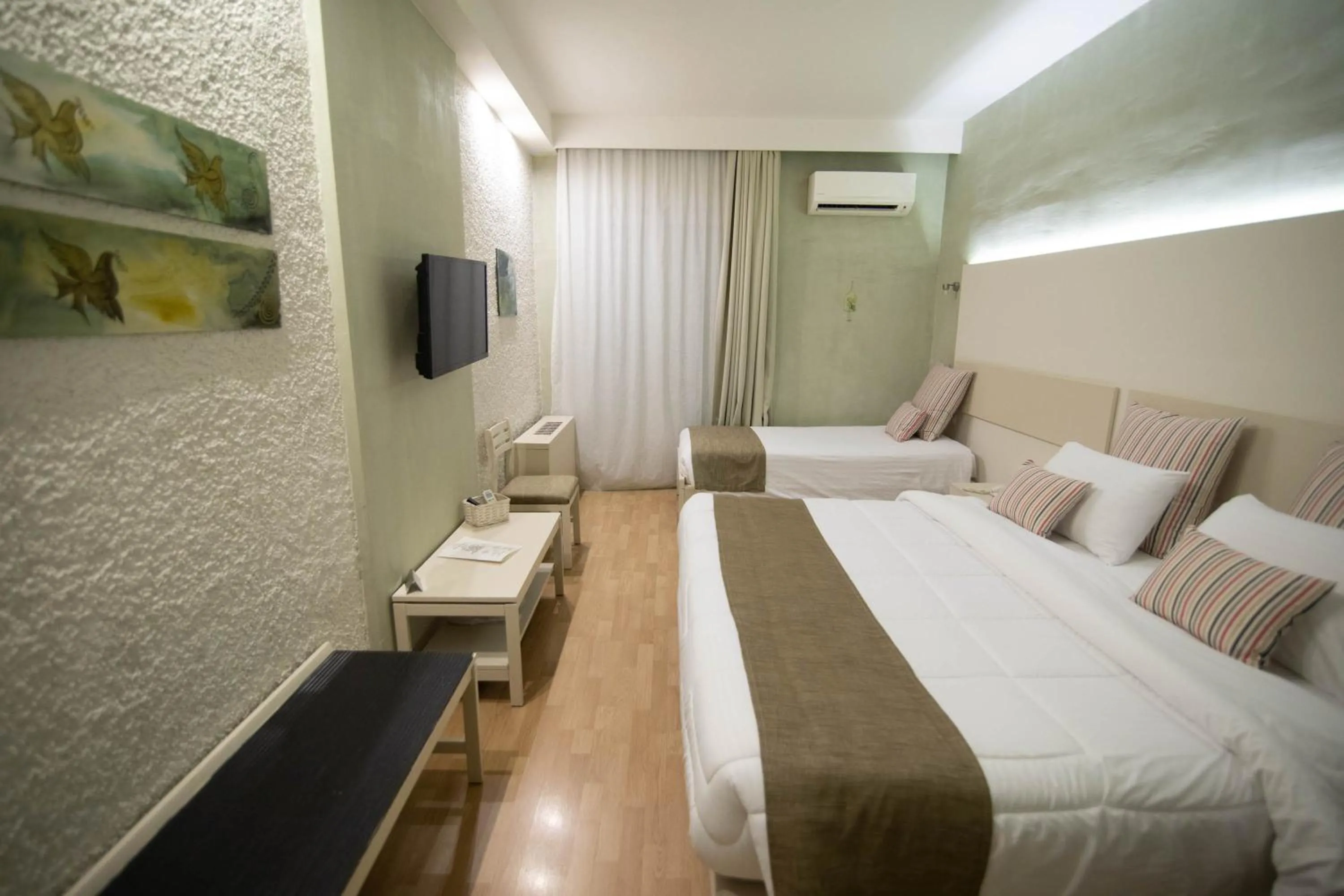 Property building, Bed in Nidimos Hotel