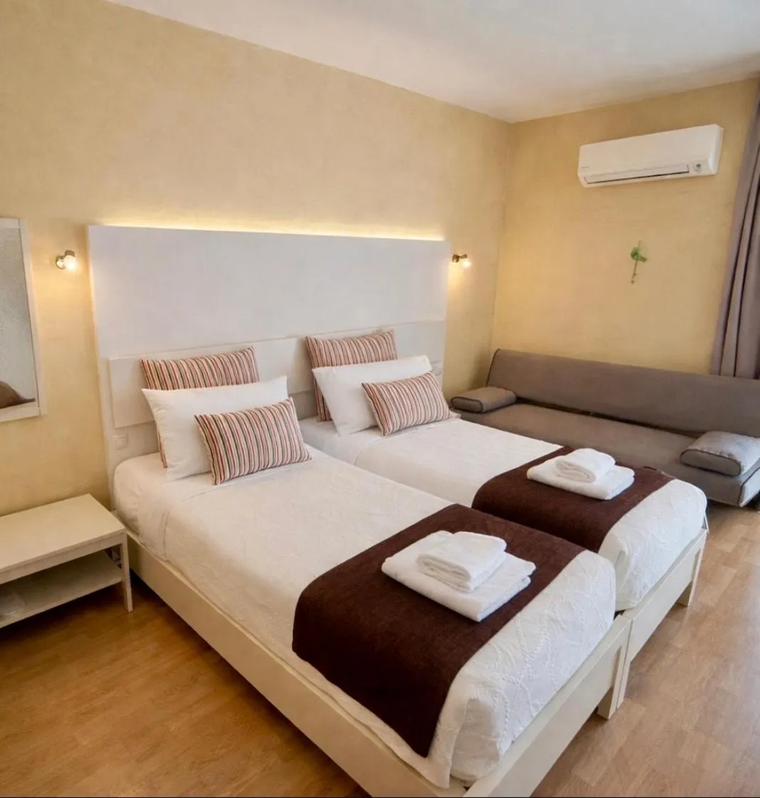 Bed in Nidimos Hotel