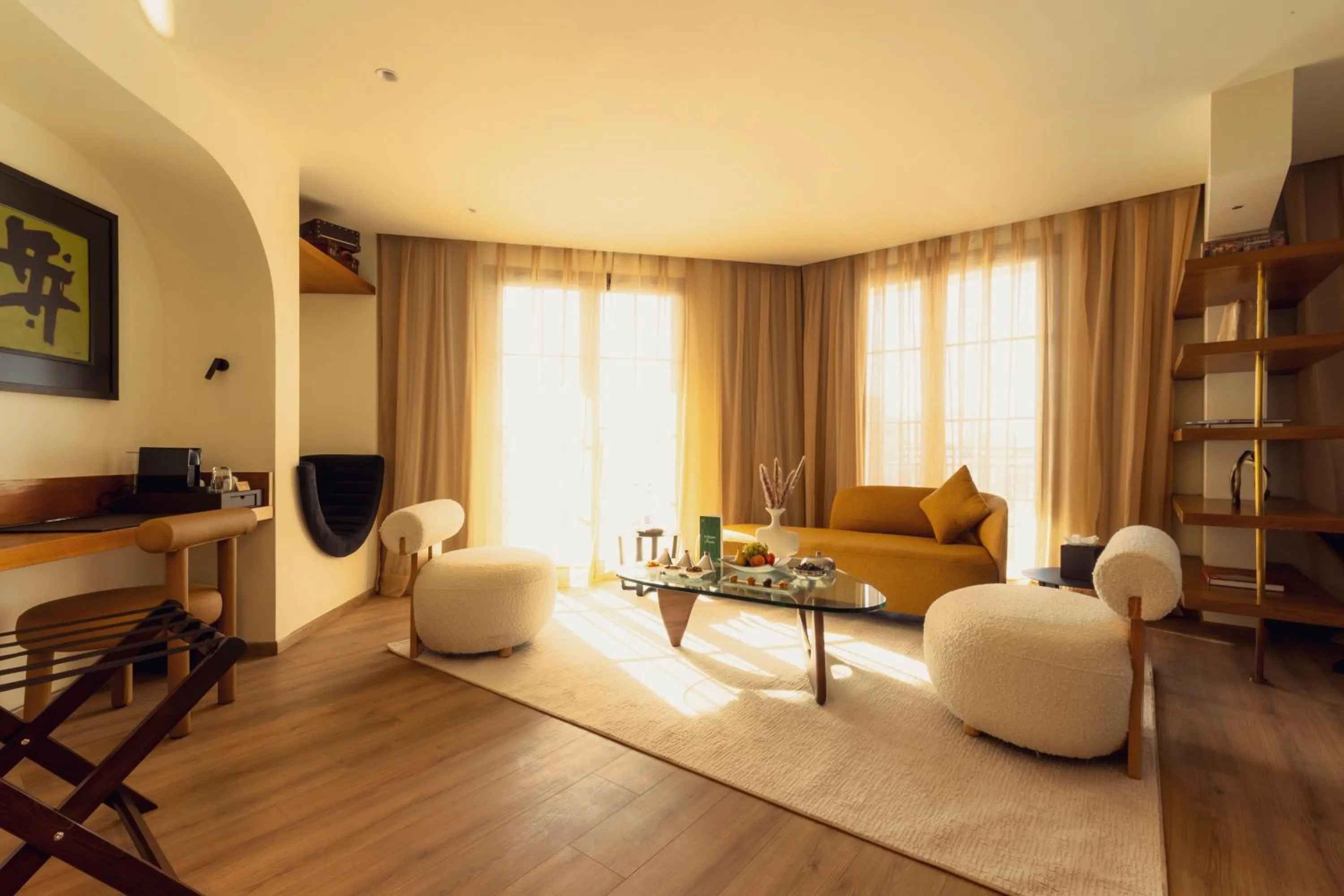 Communal lounge/ TV room in Le Square By Onomo Collection