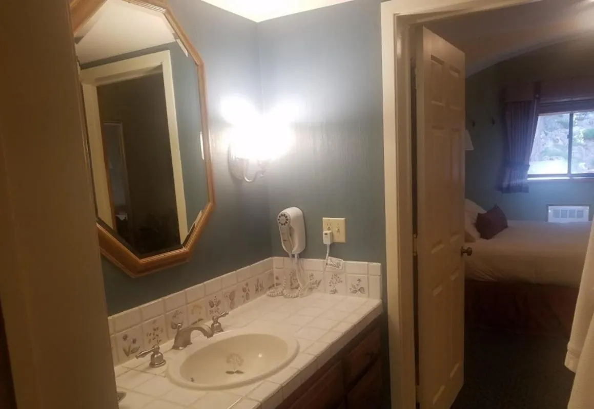 Bathroom in GetAways at Olympic Village Inn