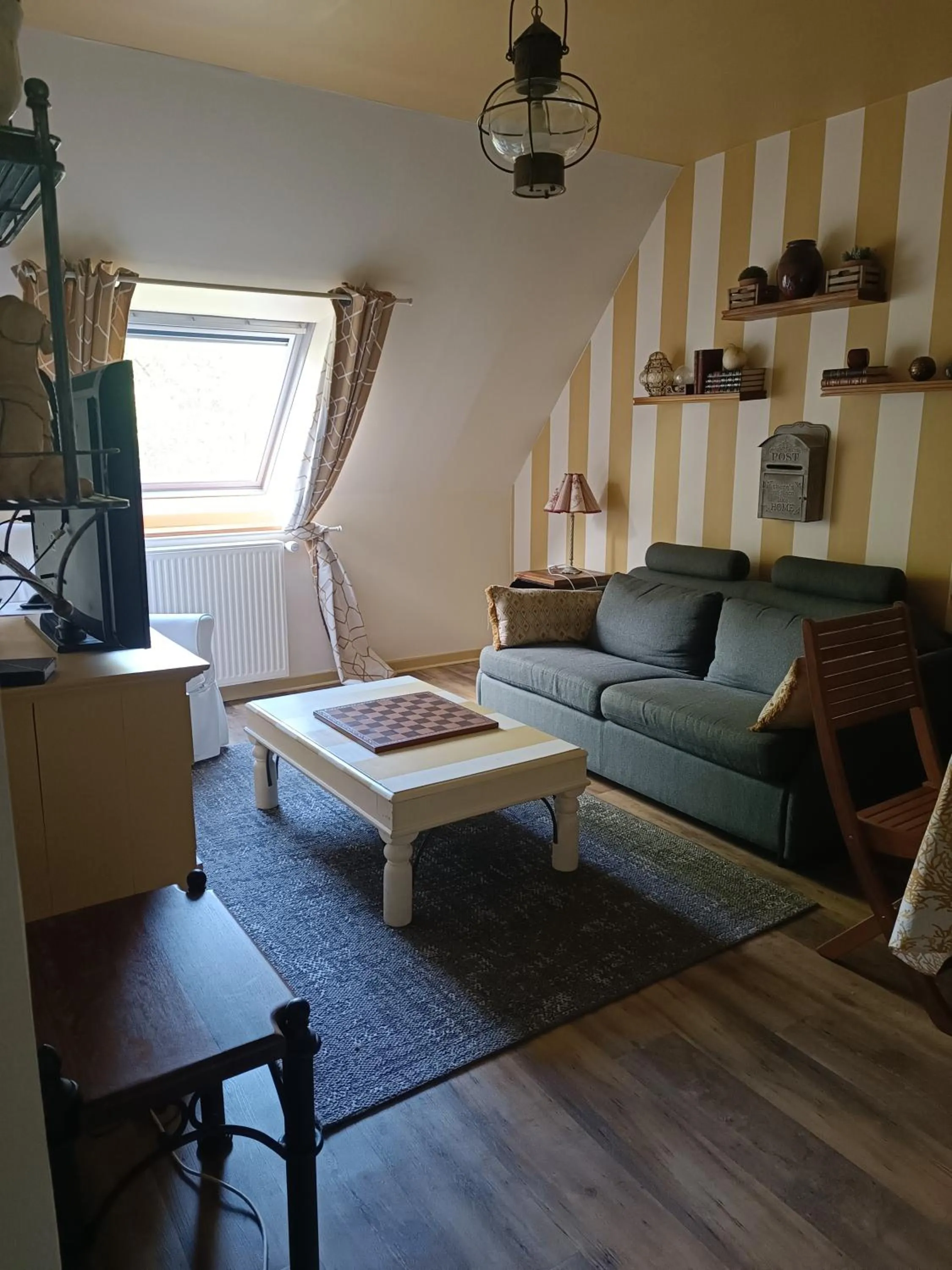Living room in Maison dans un environnement boisé très calme