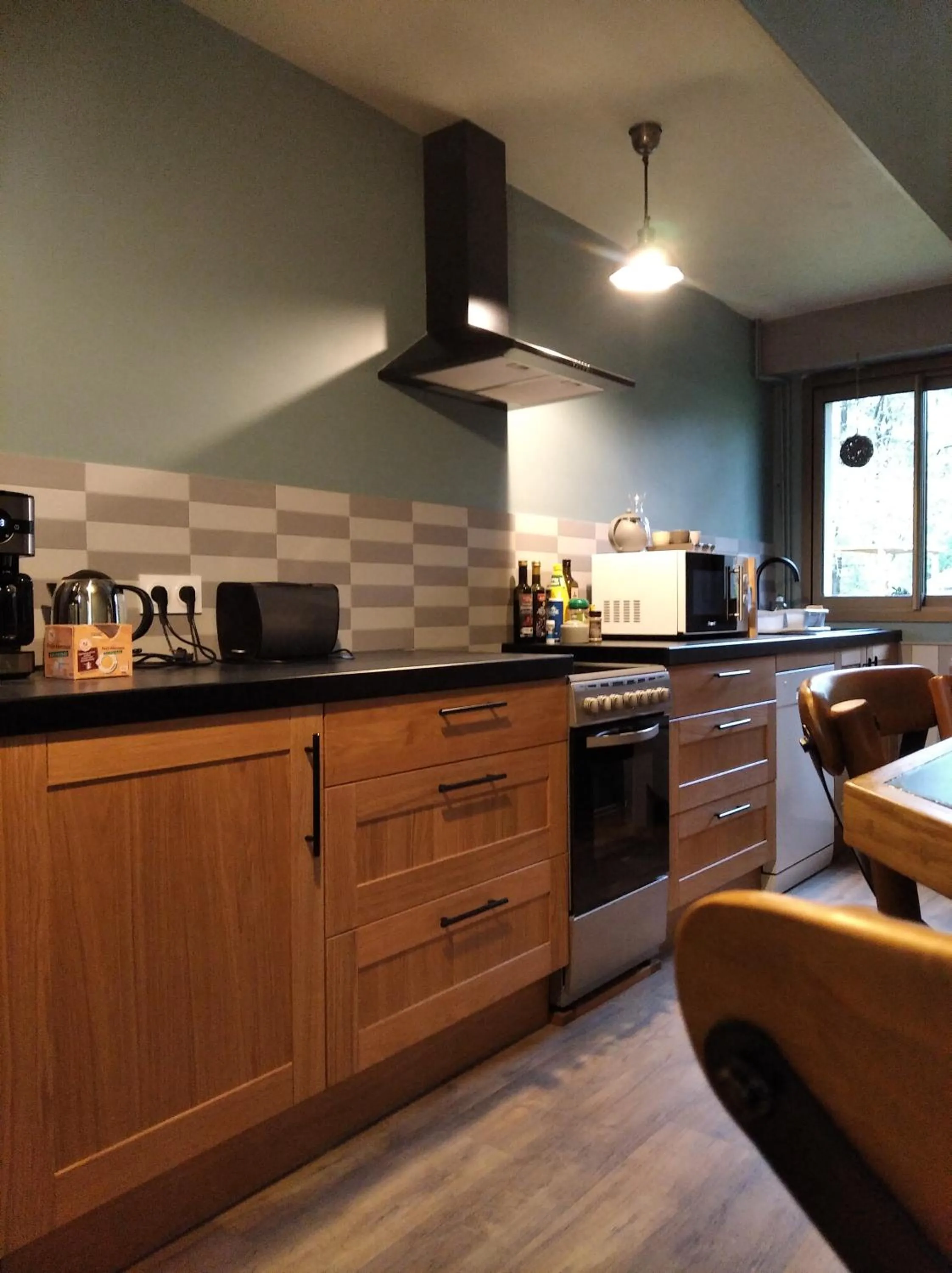 kitchen in Maison dans un environnement boisé très calme
