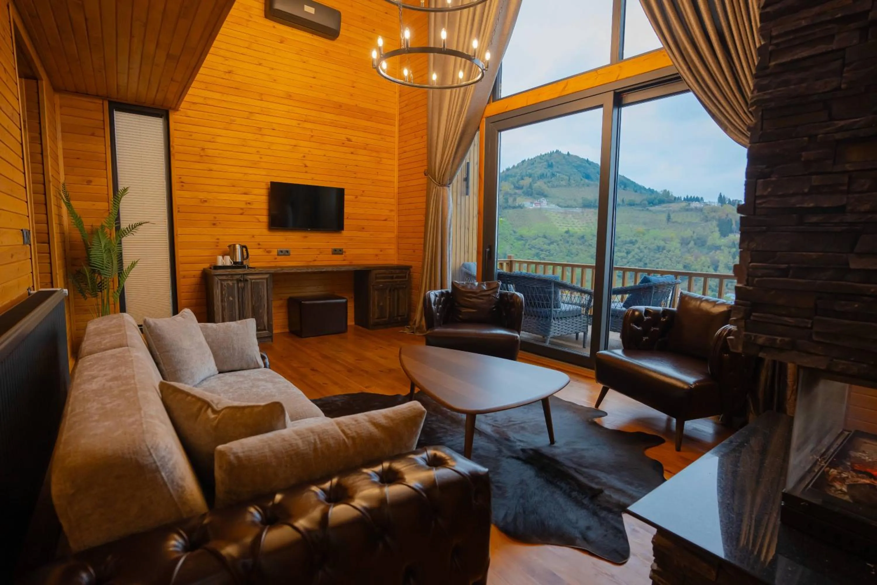 Communal lounge/ TV room in Mağmat Resort & Bungalows