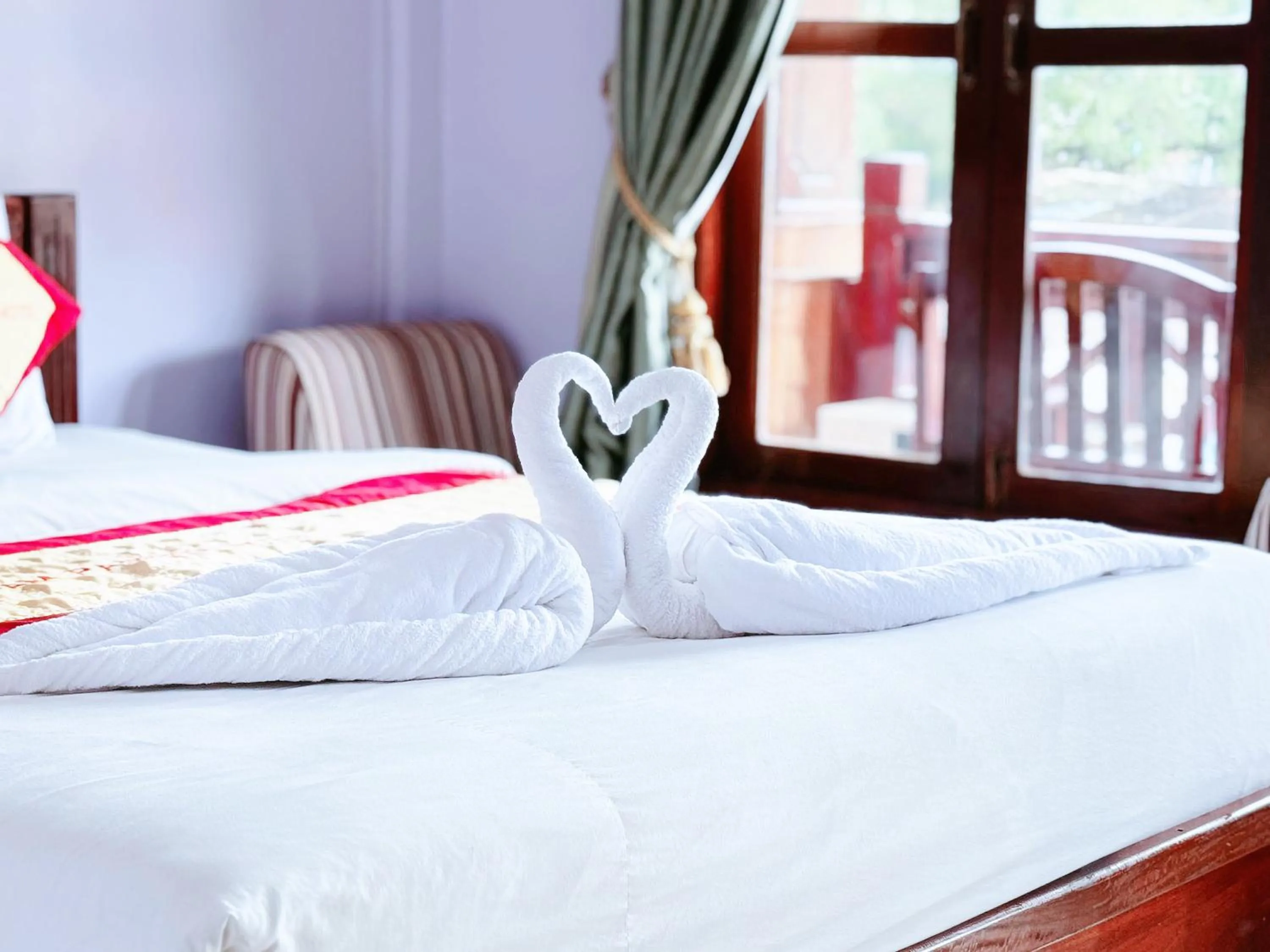 Bed in Khampaseuth Hotel