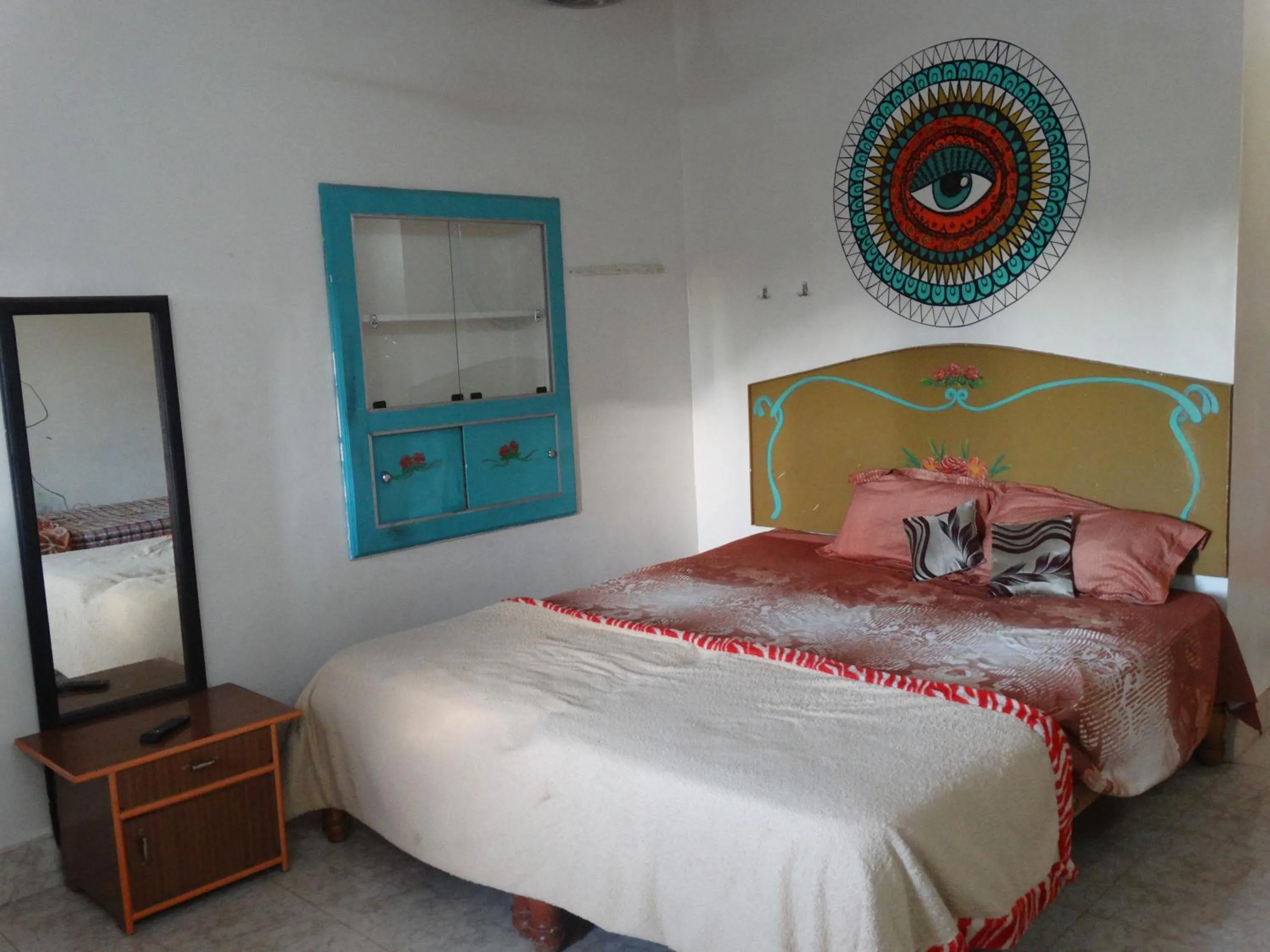 Bed in Padmaa Hampi Villa