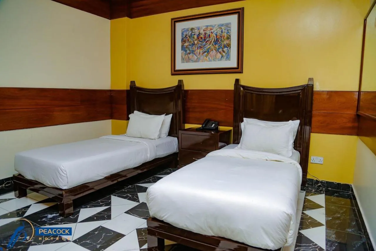 Bed in Peacock Hotel