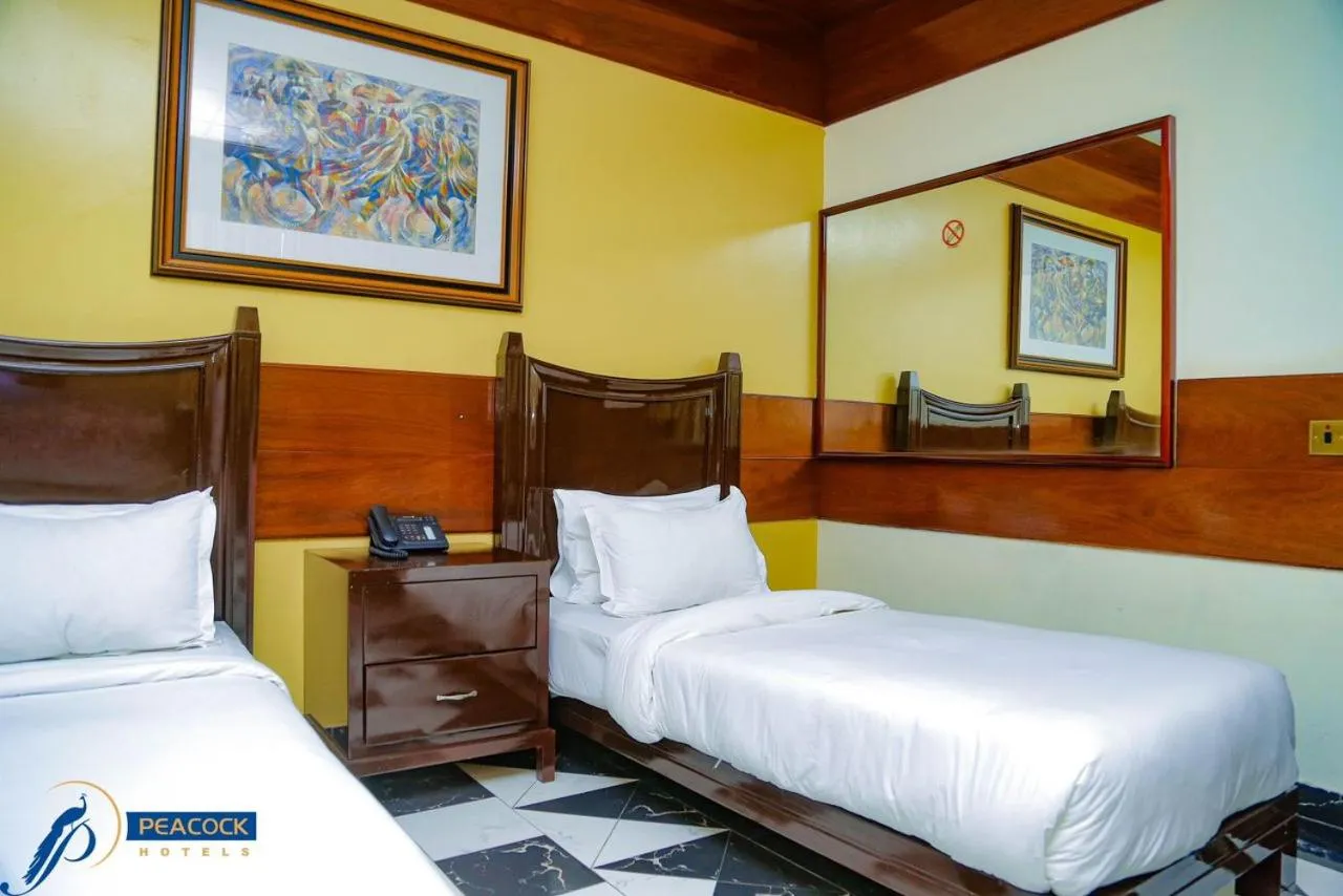 Bed in Peacock Hotel