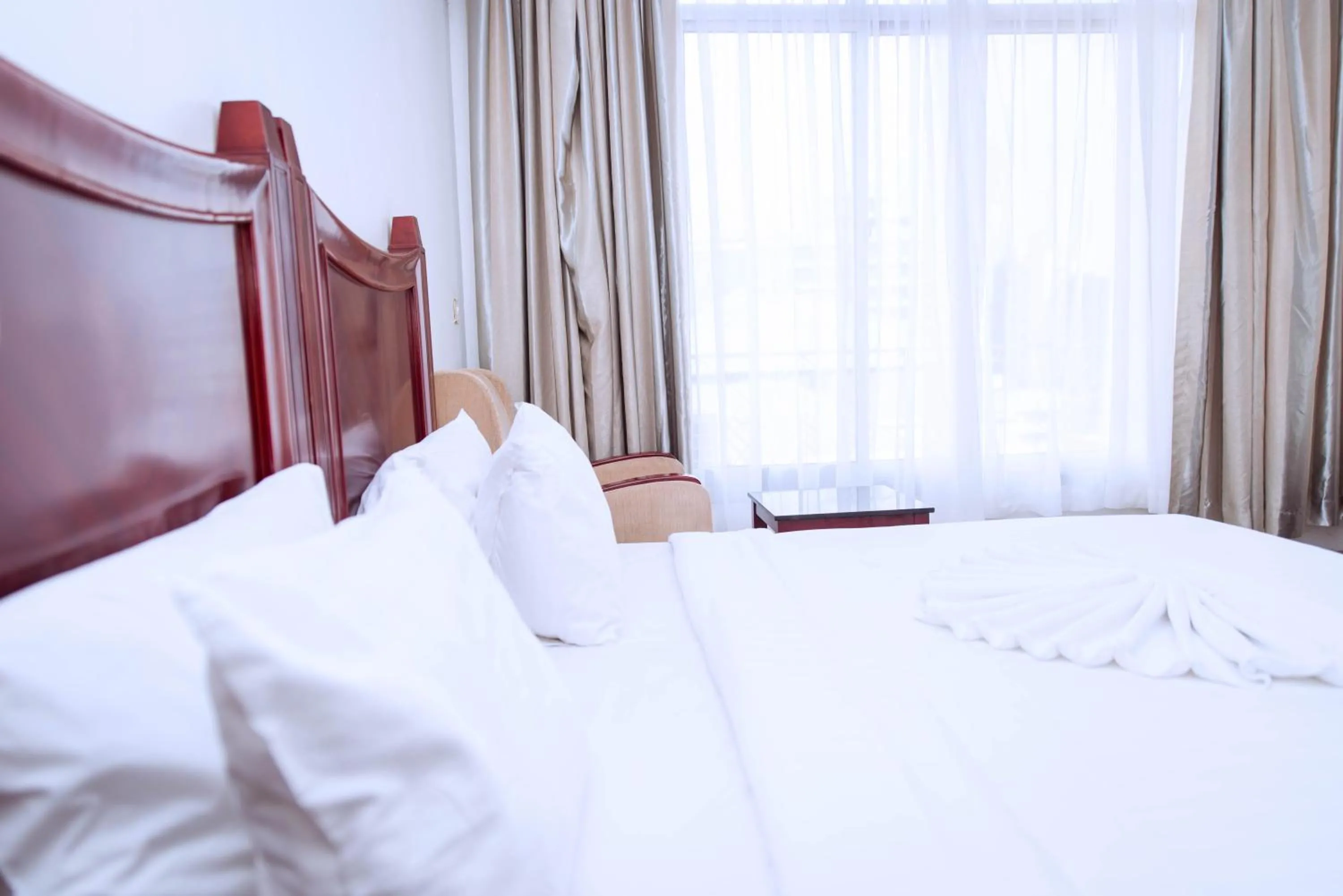 Bedroom in Peacock Hotel