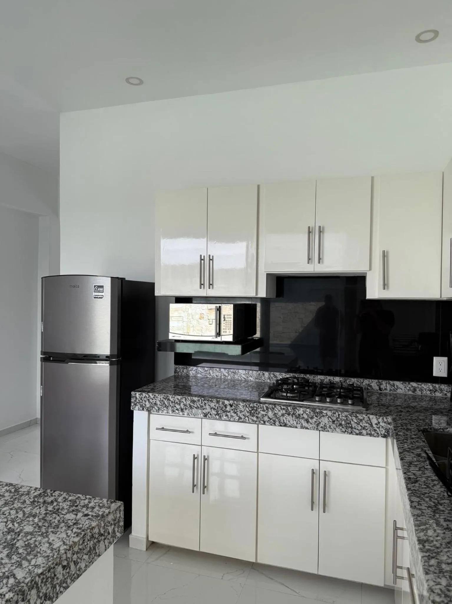 Kitchen or kitchenette in Safiro Suites Guayabitos Apartments - Adults Only