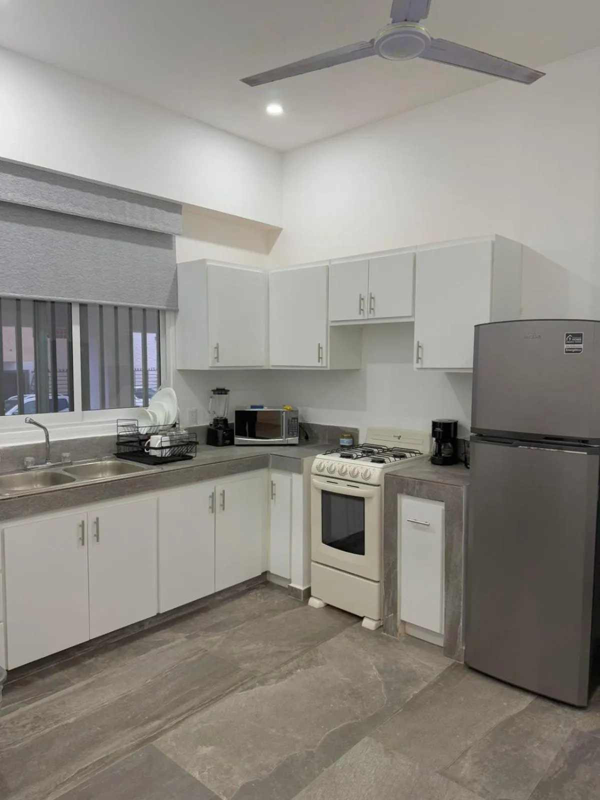 Kitchen or kitchenette in Safiro Suites Guayabitos Apartments - Adults Only