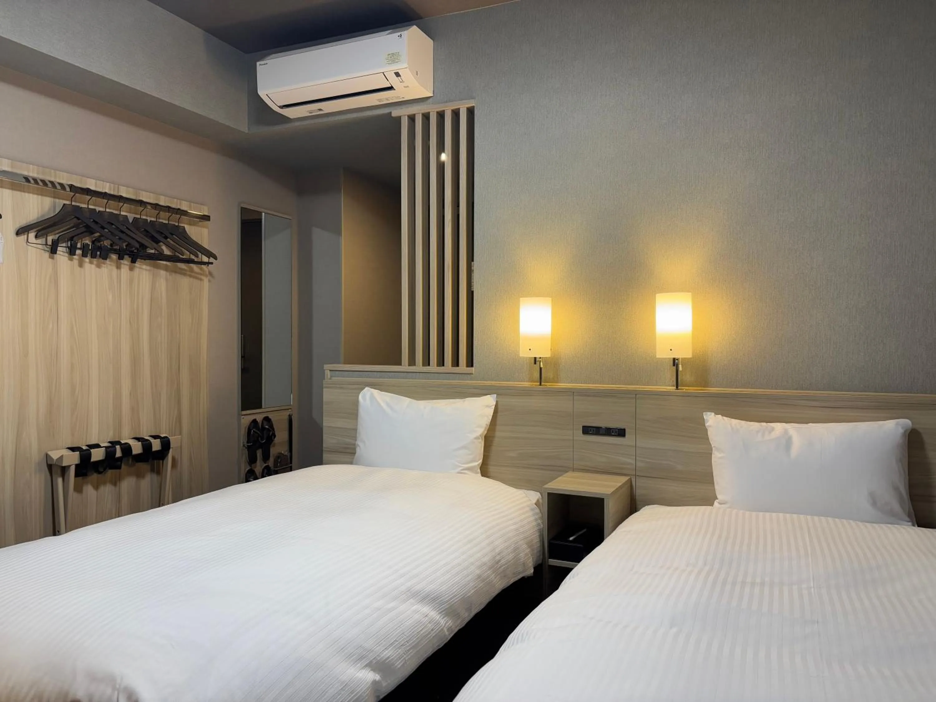 Photo of the whole room, Bed in Hotel Route Inn Okayama Maniwa