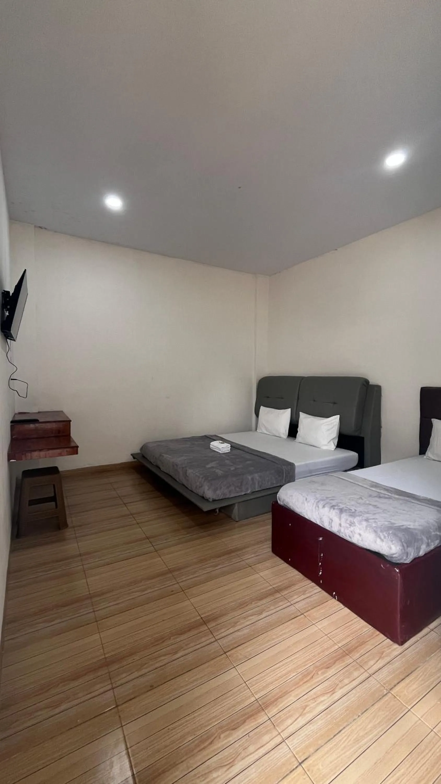 Bed in BI Hotel Kisaran