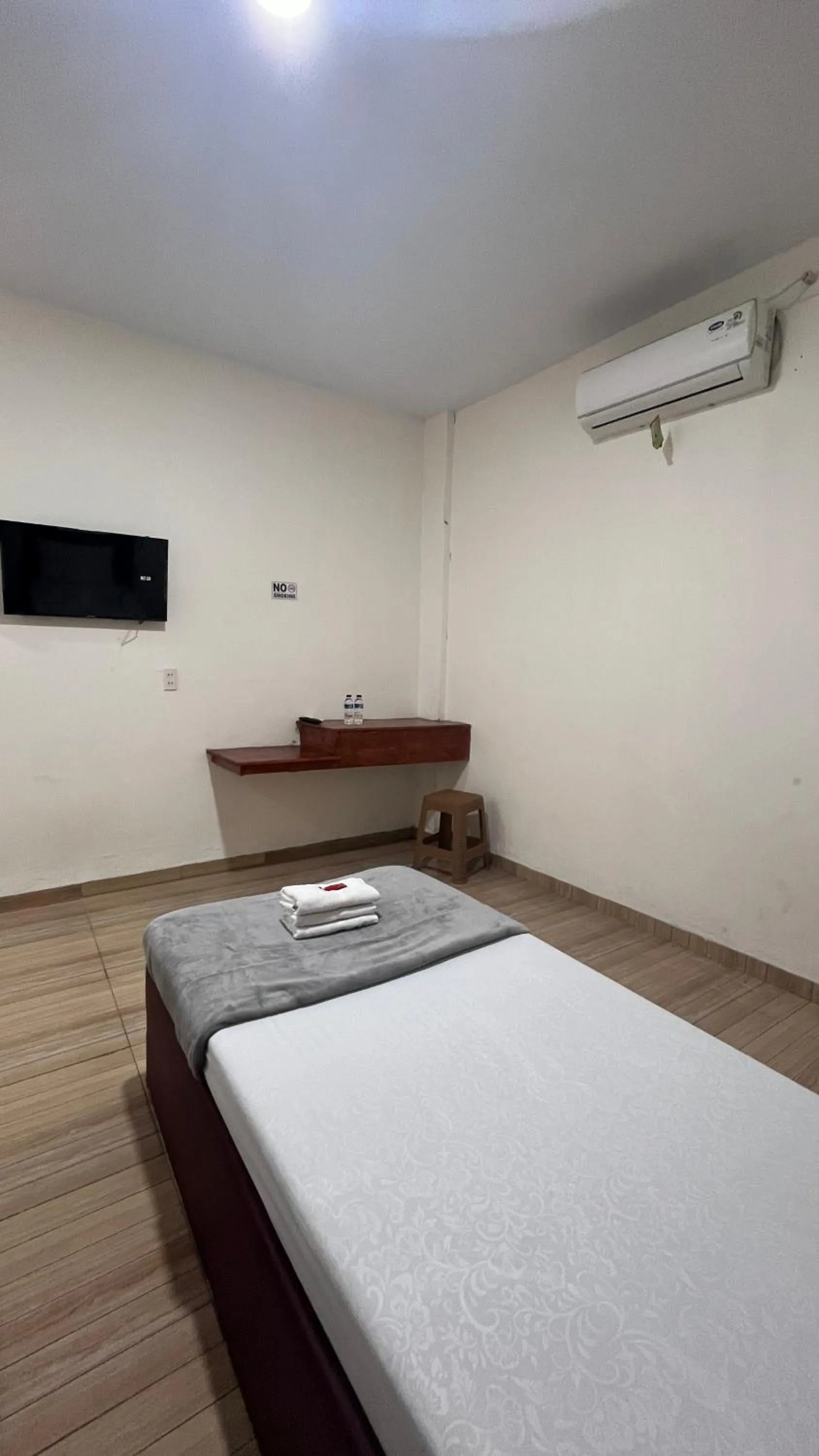 Bed in BI Hotel Kisaran