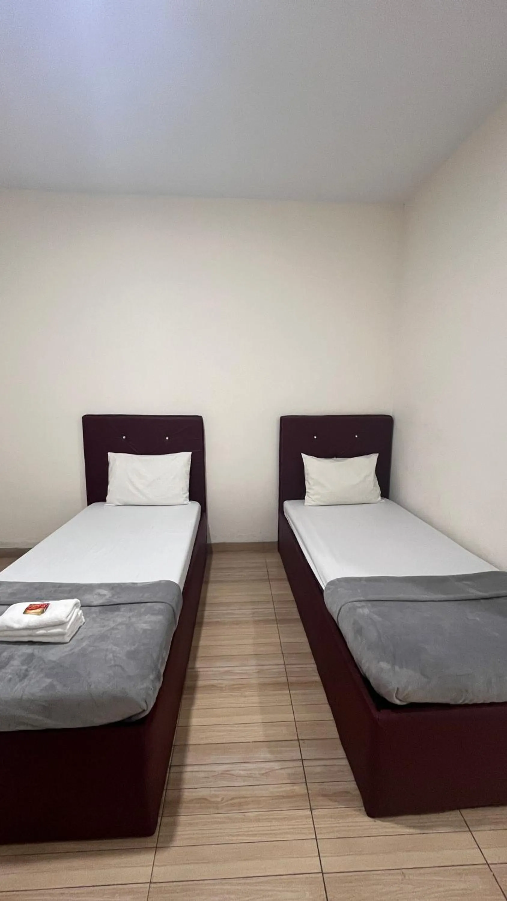 Bed in BI Hotel Kisaran