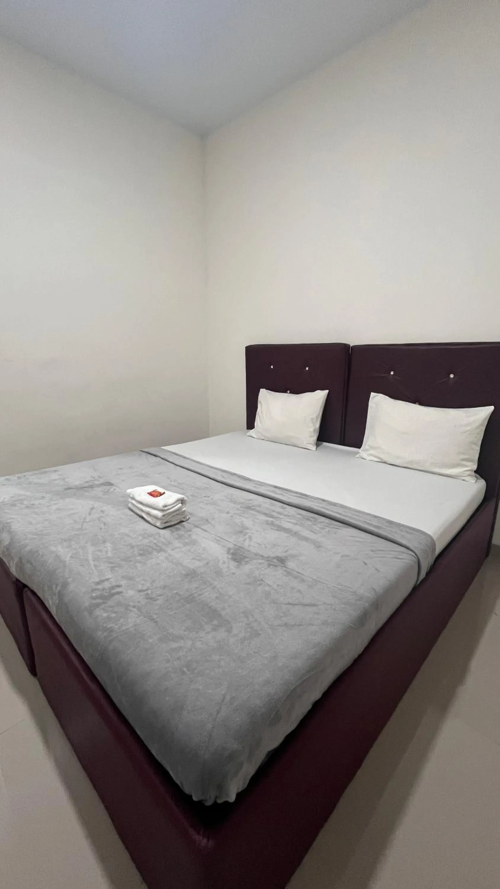 Bed in BI Hotel Kisaran