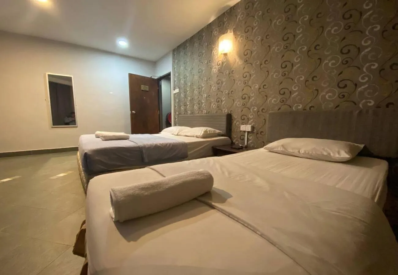 Bed in Hotel Harbour Inn