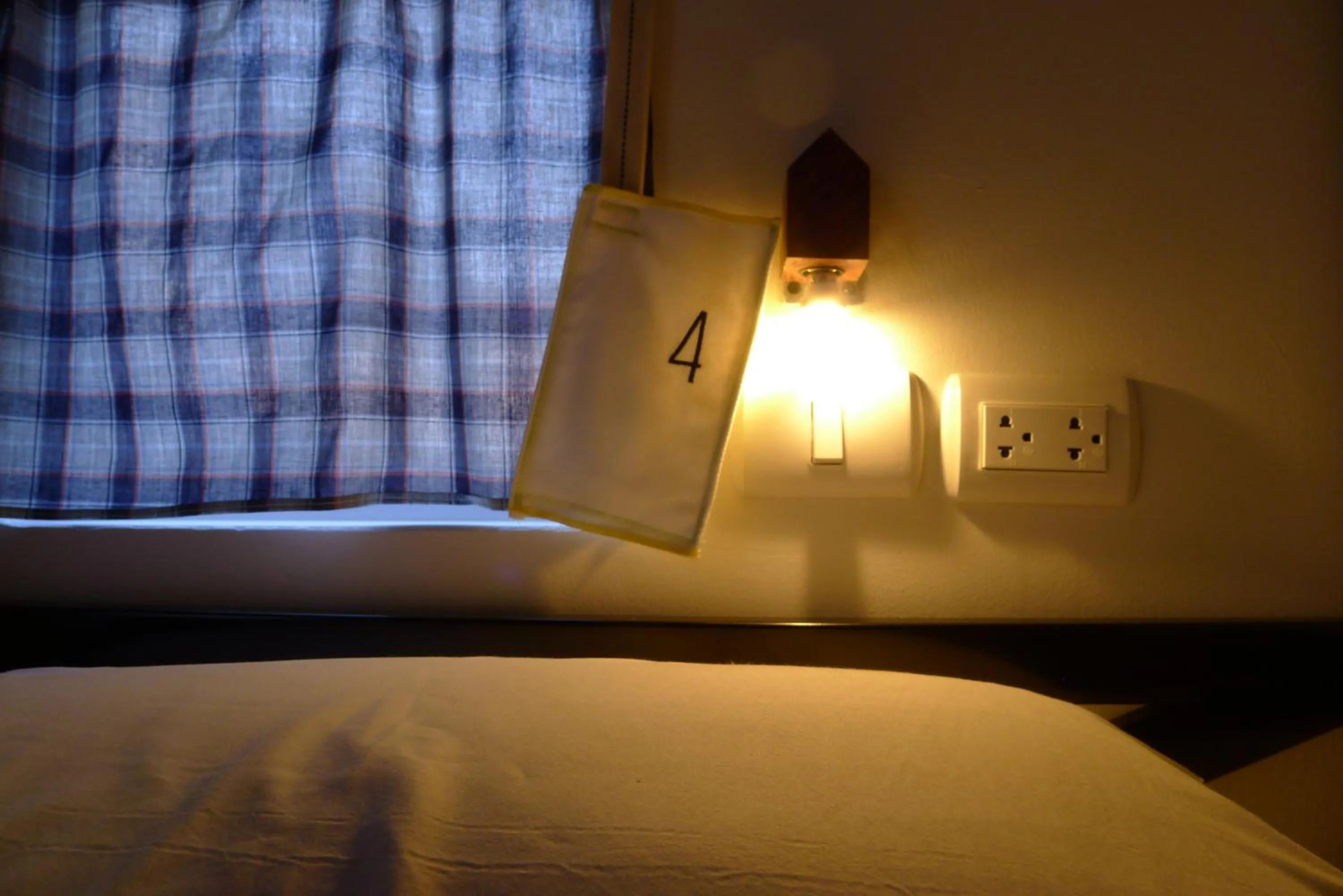 Decorative detail, Bed in The Yard Bangkok Hostel