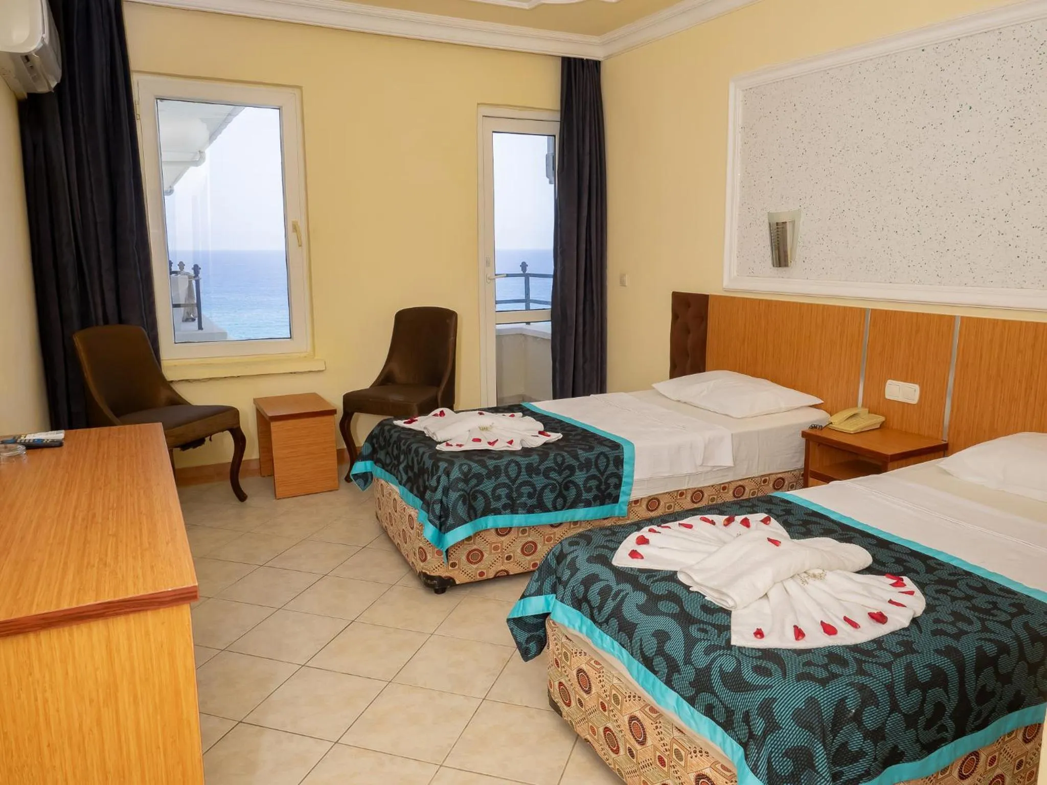 Bed in SUN FIRE BEACH Hotel