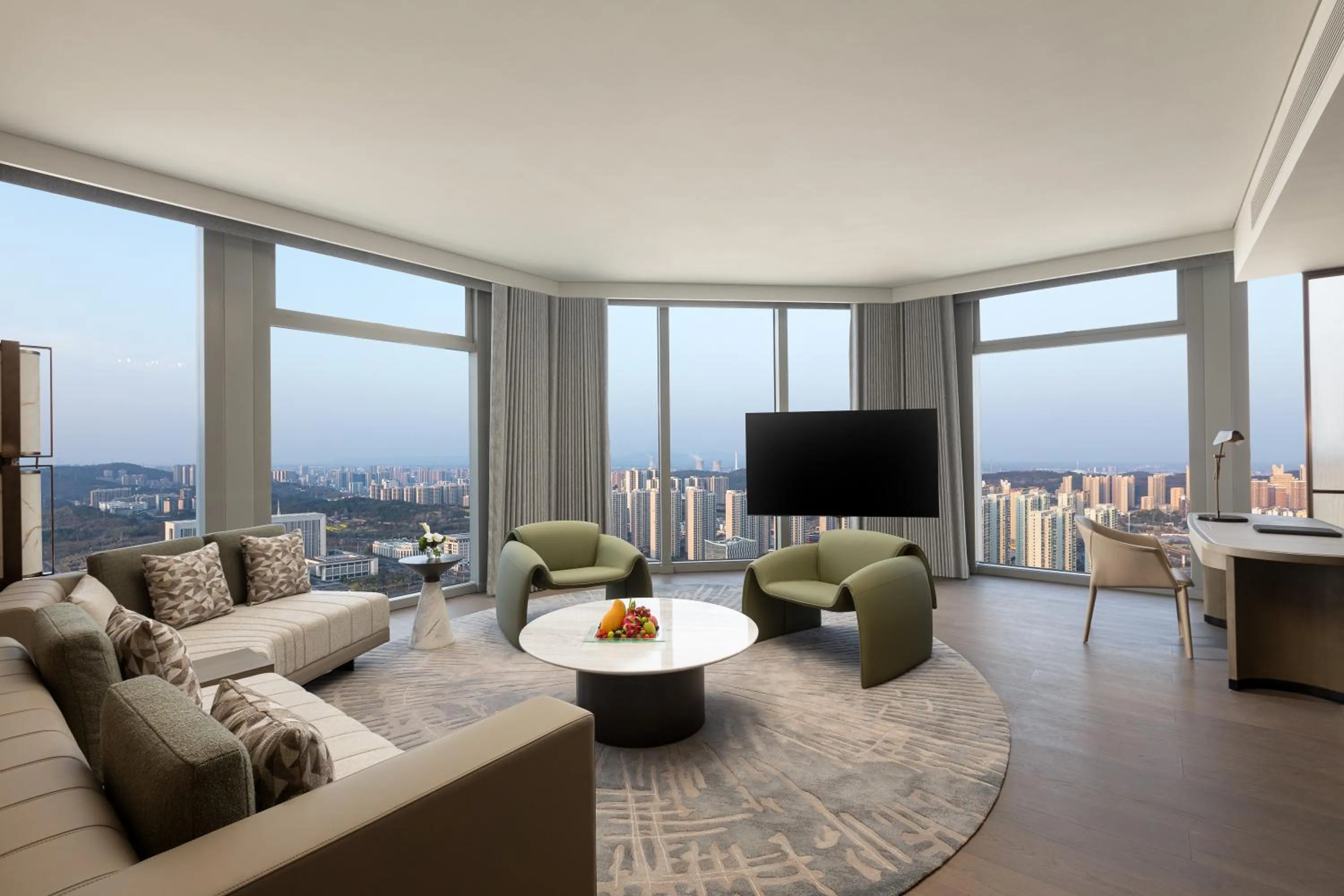 Living room in Crowne Plaza Jingmen by IHG