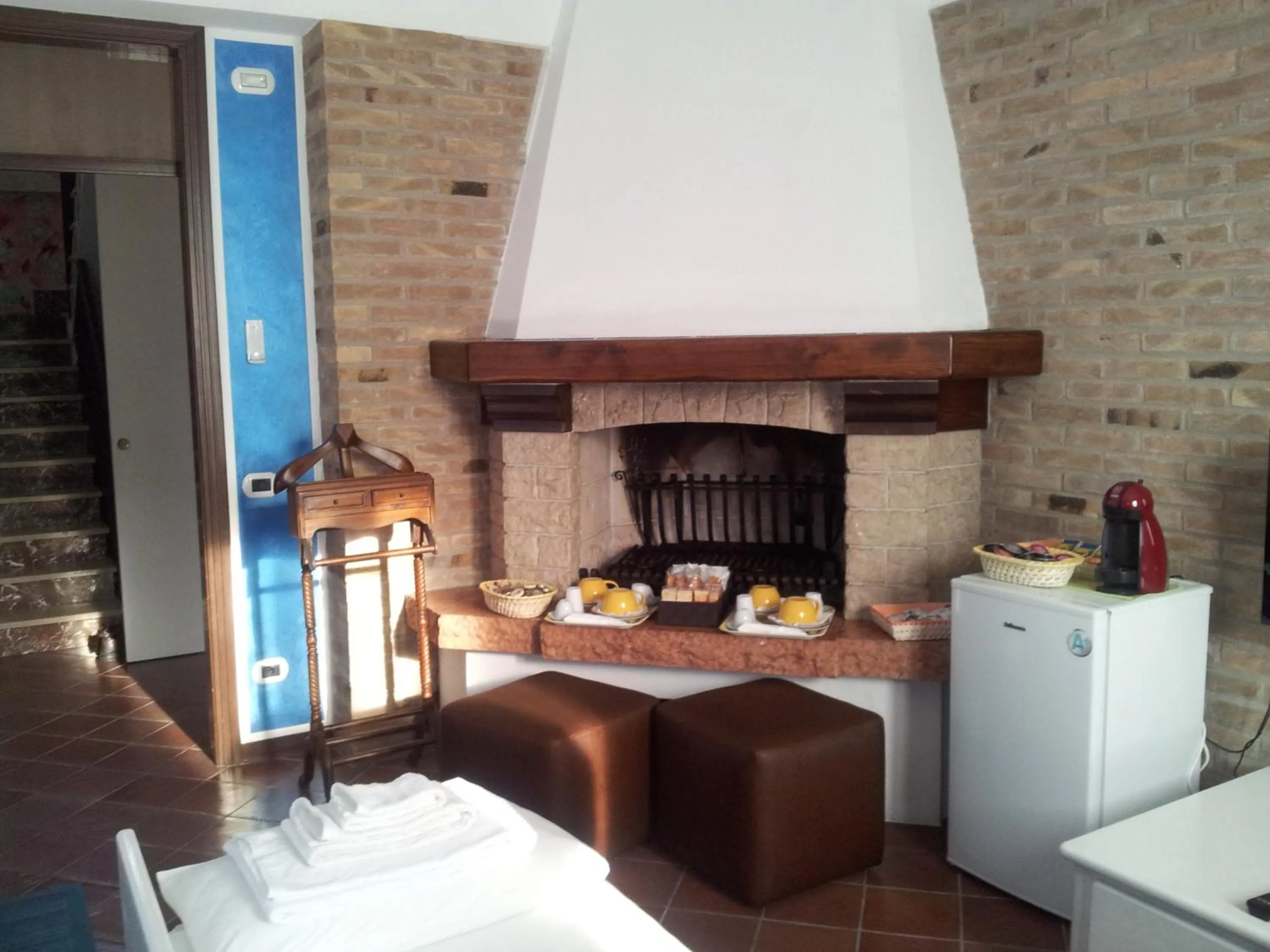 Communal lounge/ TV room in B&B Il Centralino