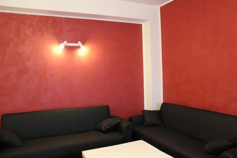 Communal lounge/ TV room in B&B Il Centralino