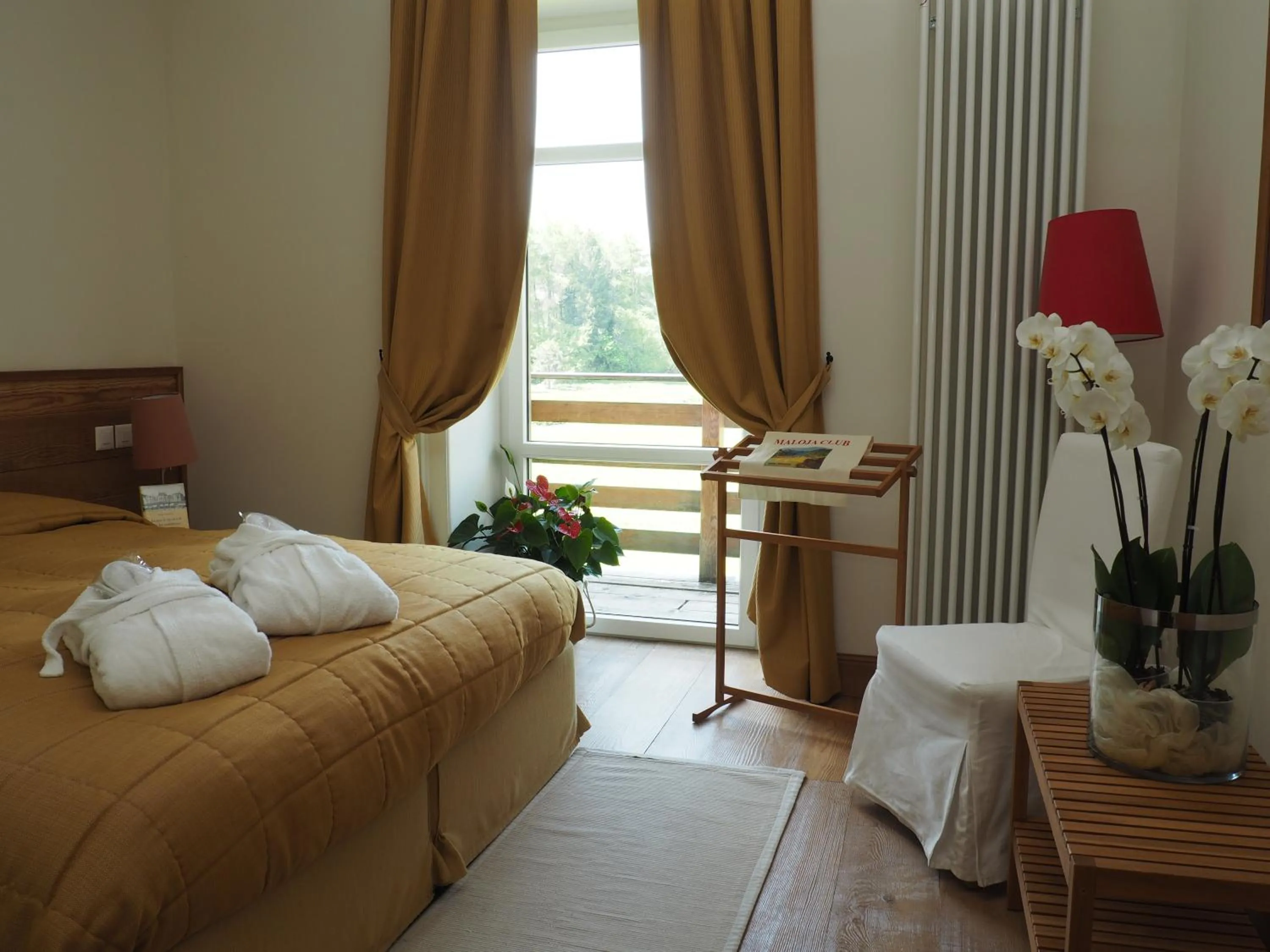 Bedroom, Bed in Maloja Palace Residence Engadin-St Moritz CO2-Neutral