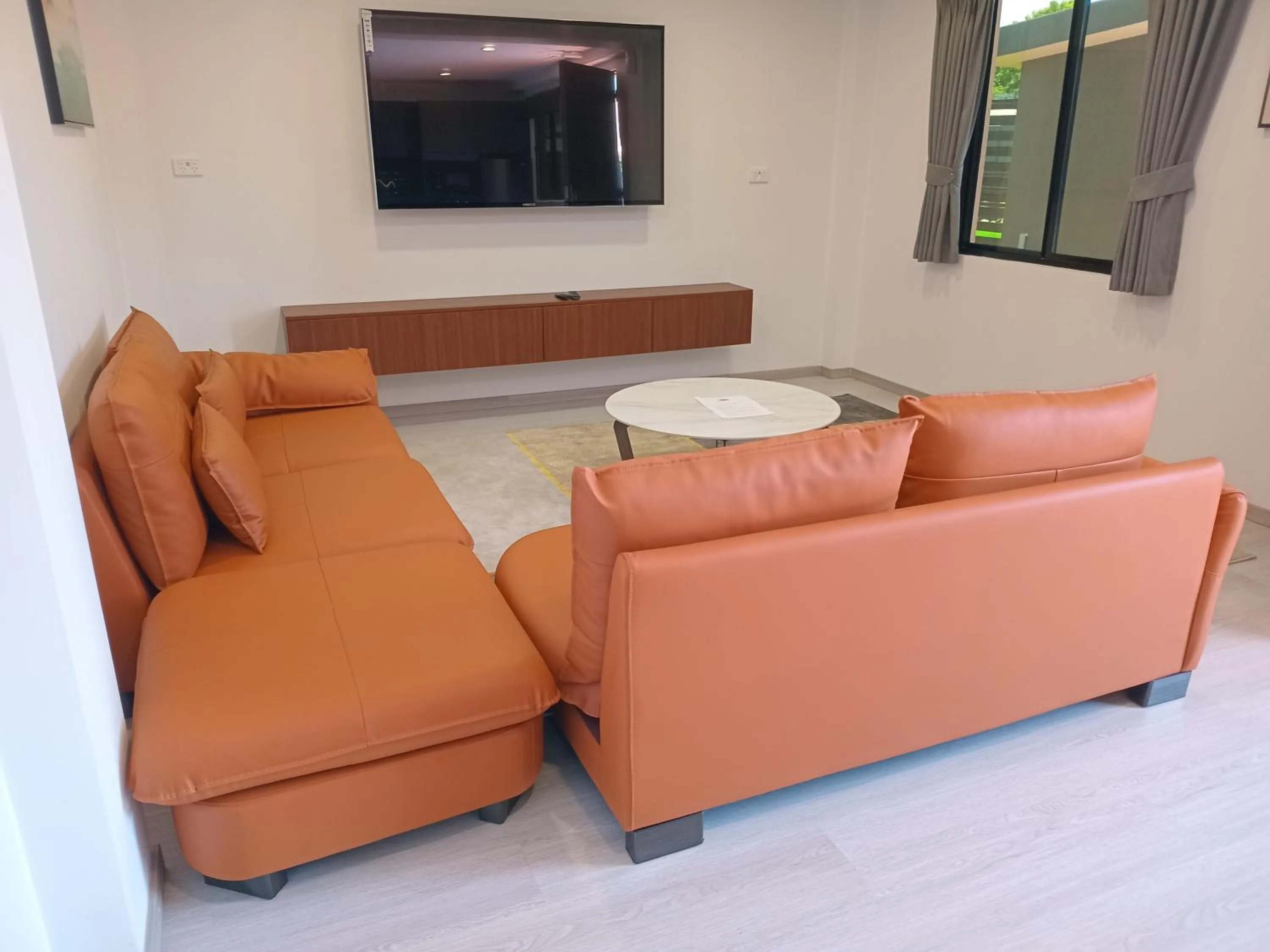 Living room in Hibiscus Suites And Residences