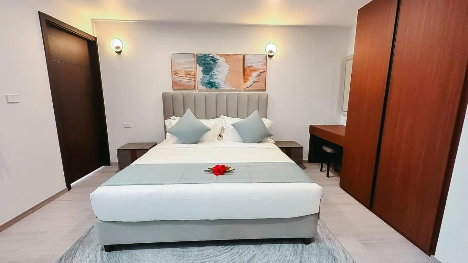 Bed in Hibiscus Suites And Residences