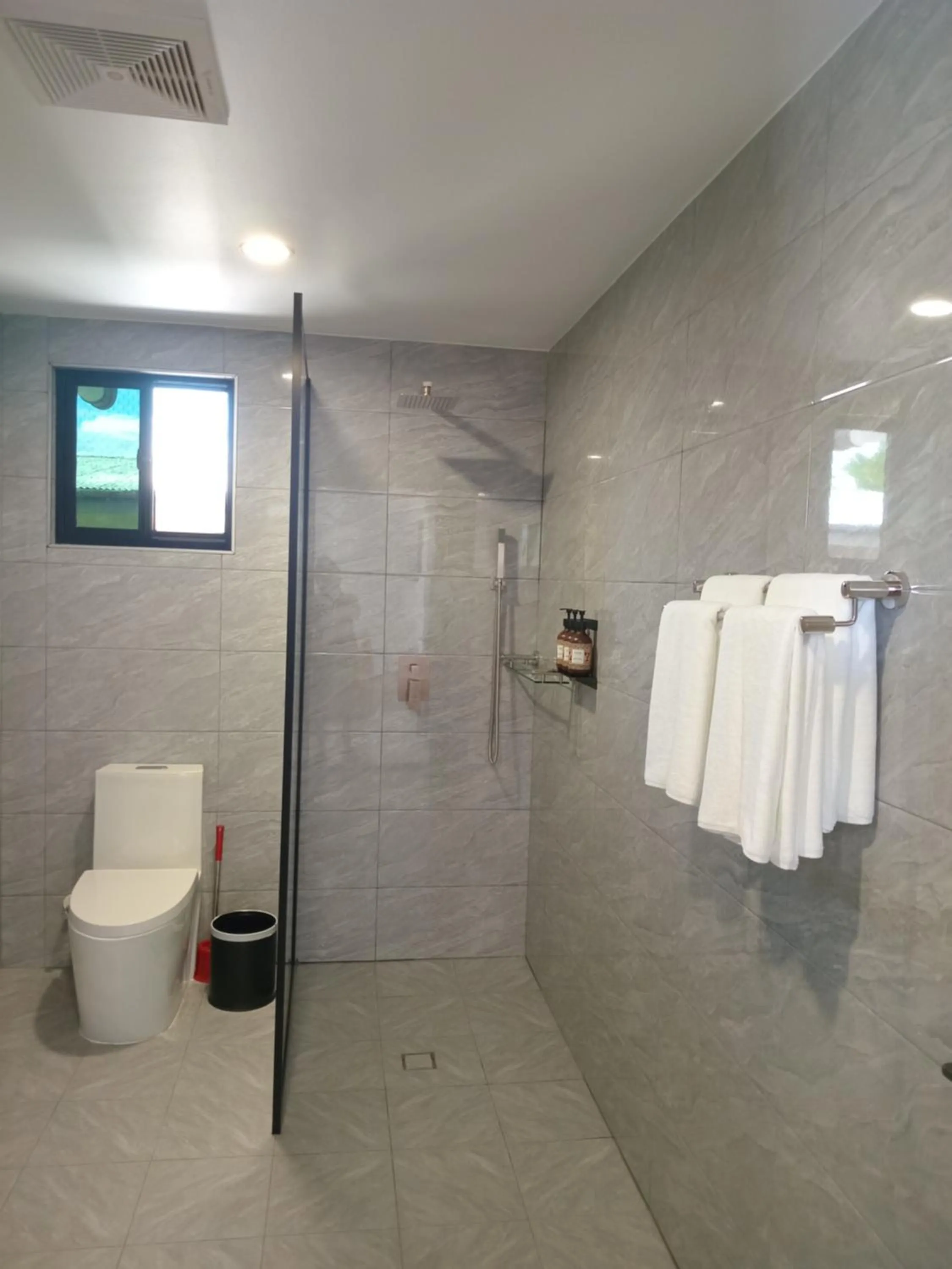 Shower in Hibiscus Suites And Residences