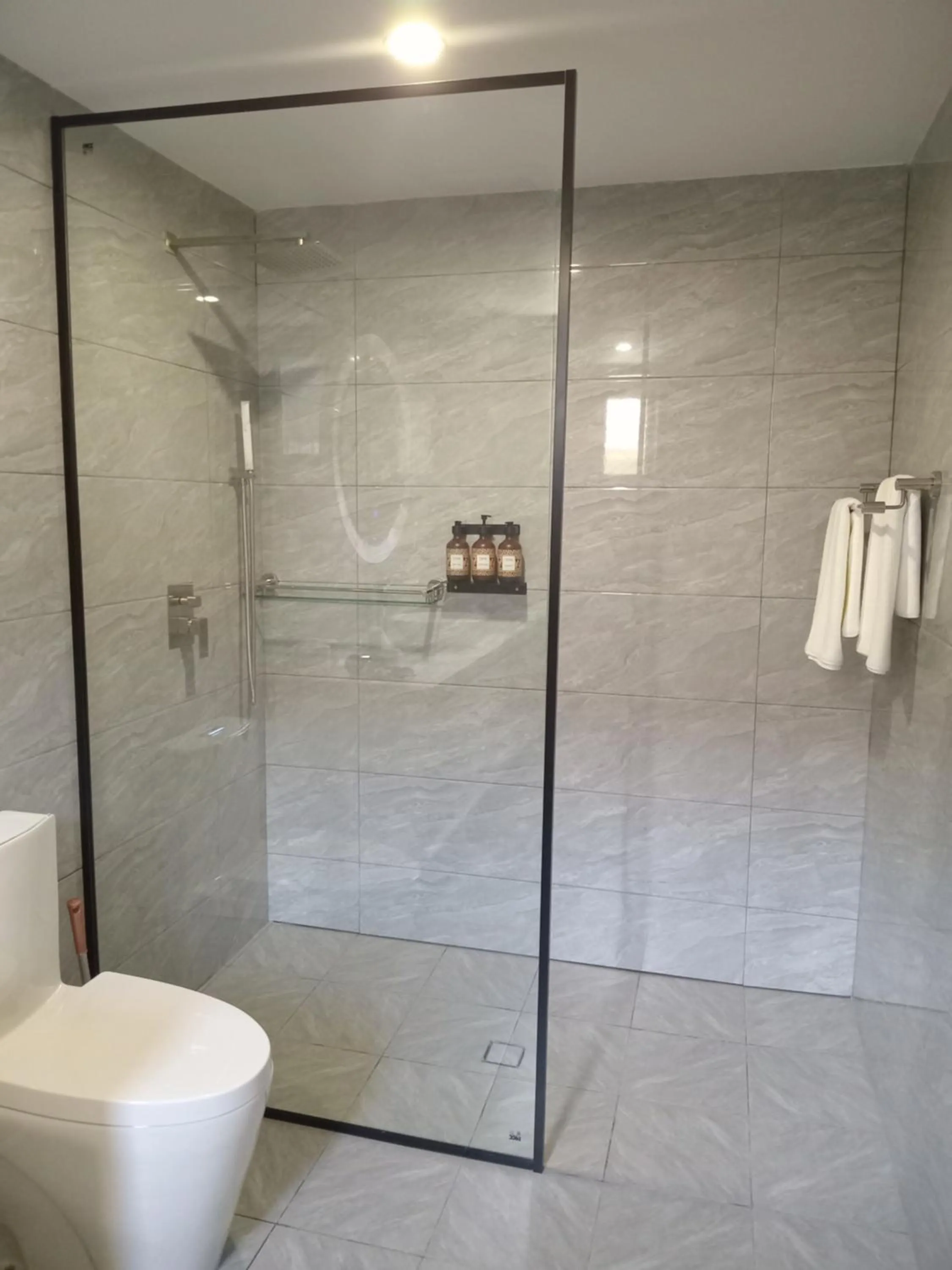 Bathroom in Hibiscus Suites And Residences