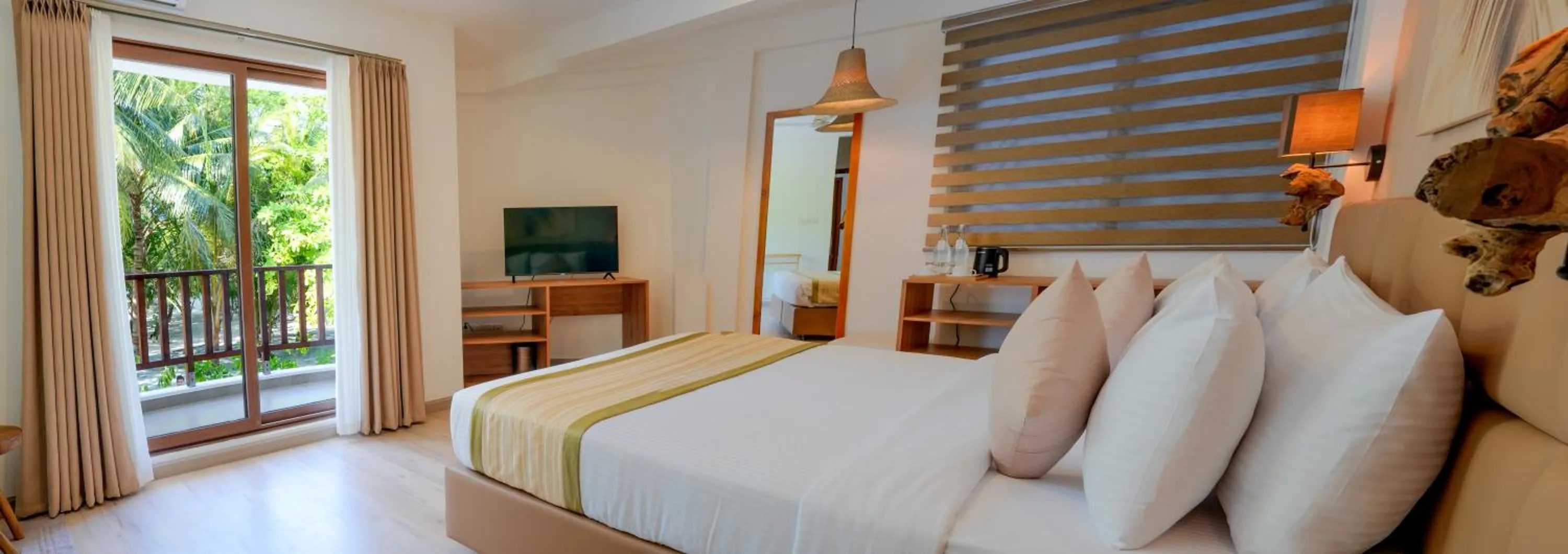 Bed in Cocomo Maldives