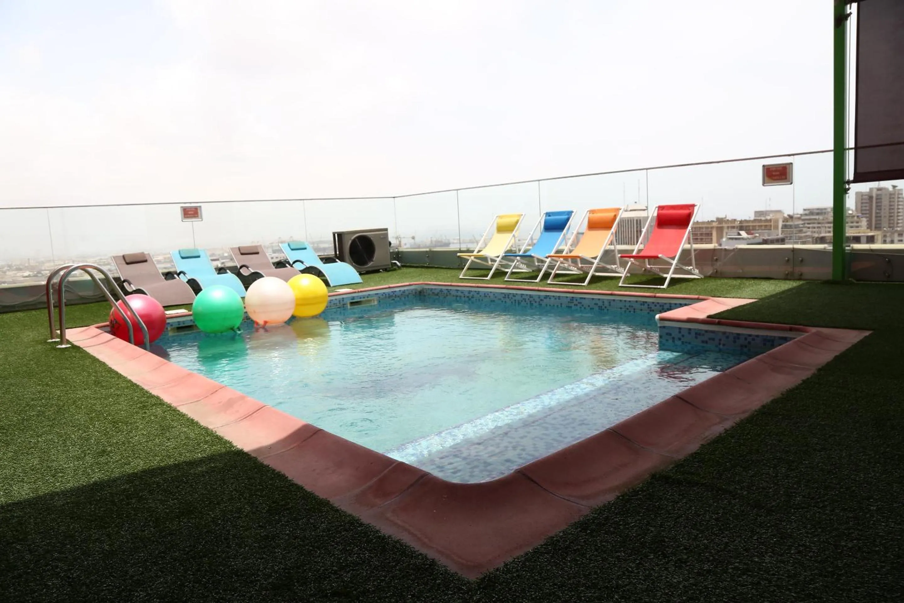 Swimming pool in Hôtel Fleur de Lys Plateau