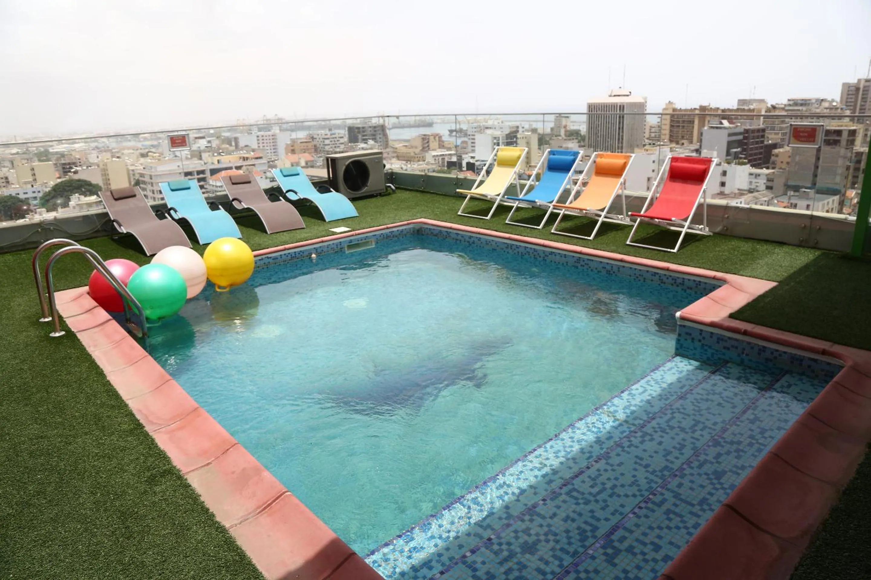 Swimming pool in Hôtel Fleur de Lys Plateau