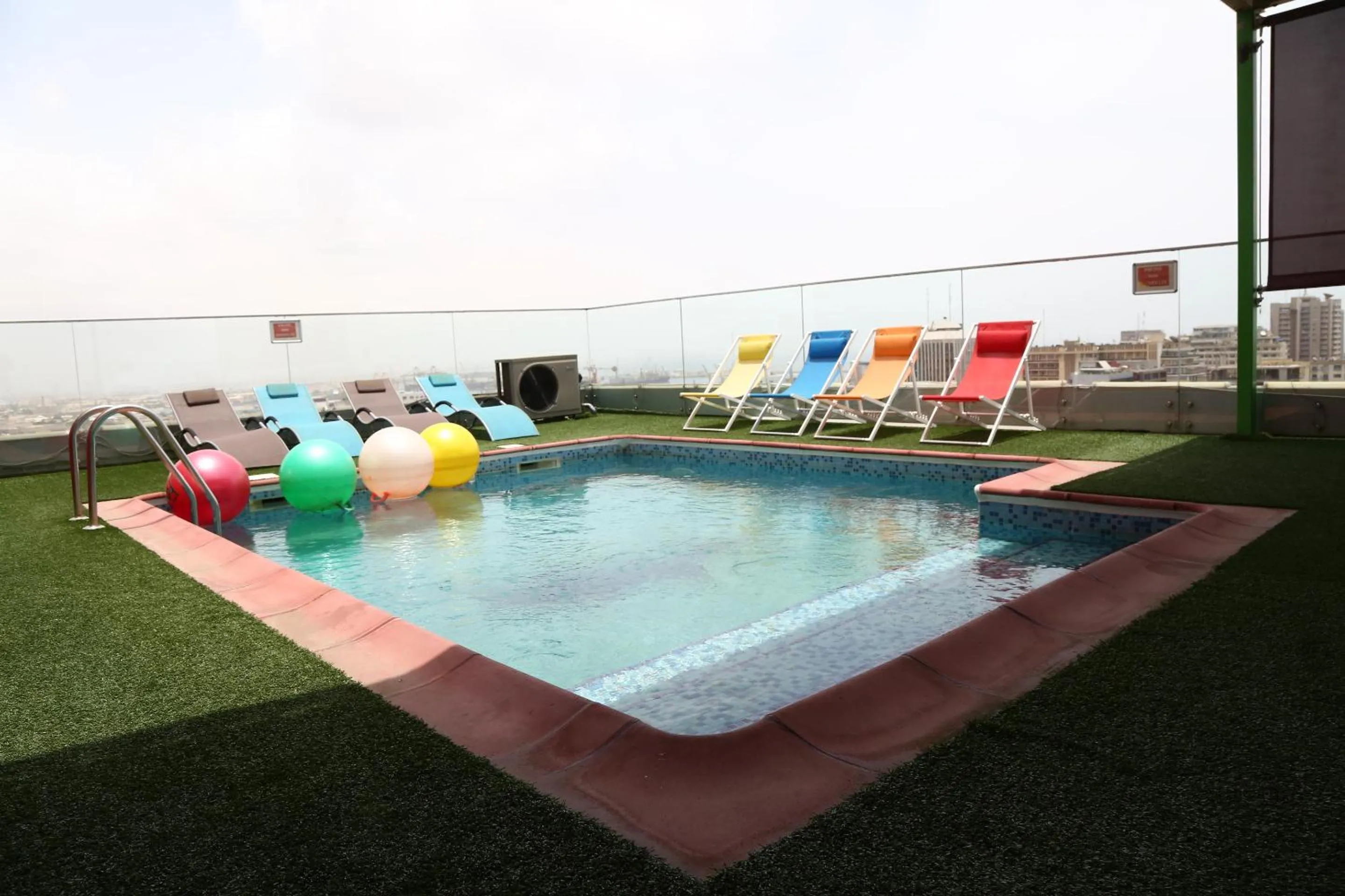 Swimming pool in Hôtel Fleur de Lys Plateau