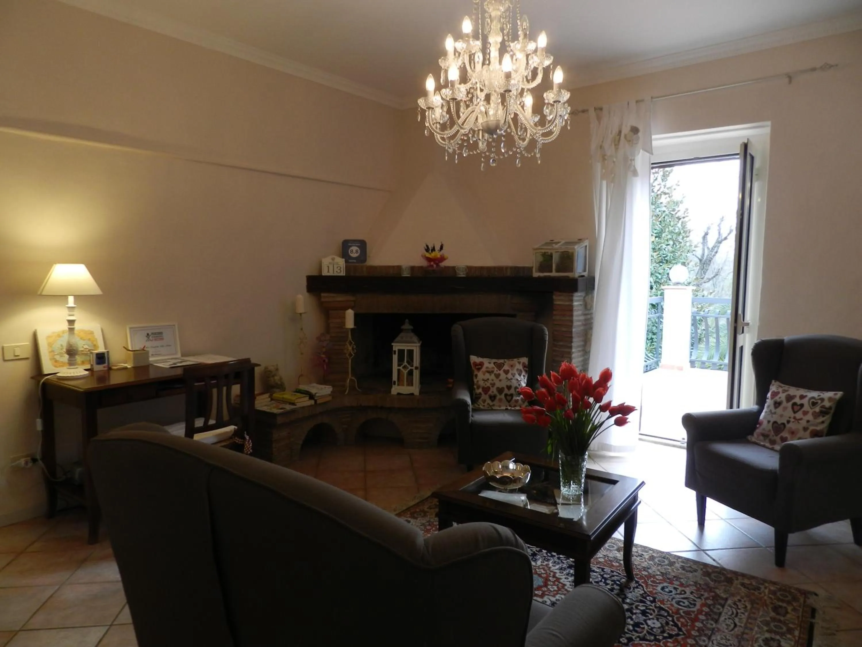 Communal lounge/ TV room in B&B Villa Maria