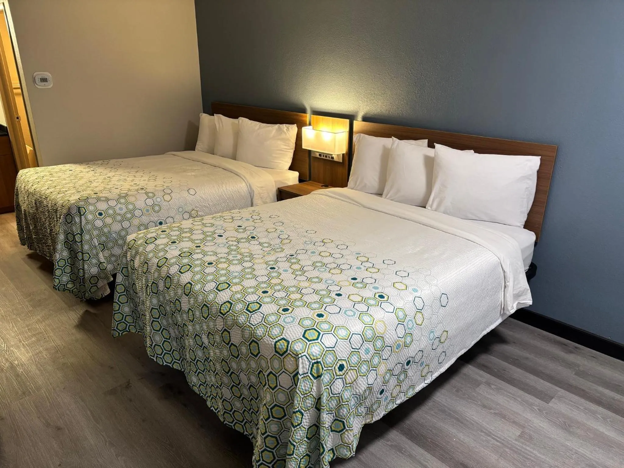 Bedroom, Bed in HomeTowne Studios by Red Roof Hagerstown - Williamsport, MD