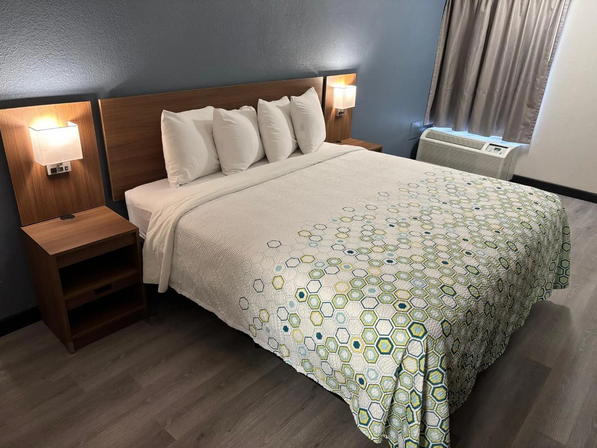 Bedroom, Bed in HomeTowne Studios by Red Roof Hagerstown - Williamsport, MD